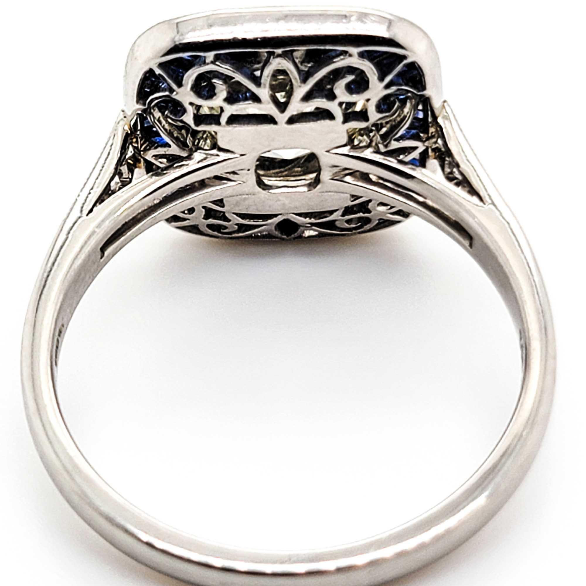 diamond surrounded by sapphires