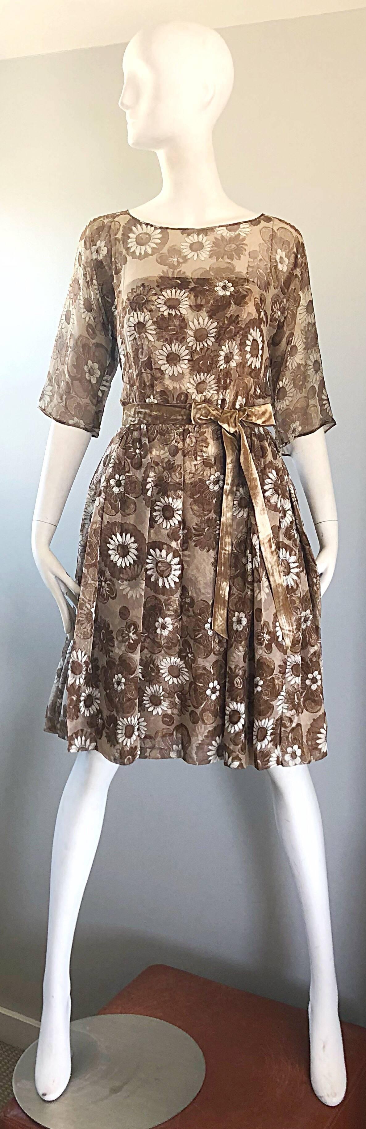 Gorgeous 50s SAKS 5th AVE. demi couture beige + taupe + ivory silk chiffon daisy print floral cocktail dress! Features a silk strapless dress, with an attached chiffon 3/4 sleeves overlay with attached silk velvet bow belt. Words cannot express both