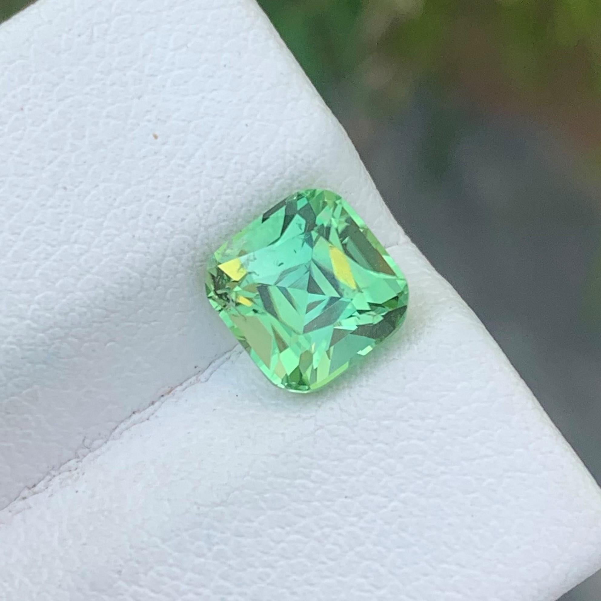 Gemstone Type : Tourmaline
Weight : 2.25 Carats
Dimensions : 7.4x7.3x5.9 Mm
Origin : Kunar Afghanistan
Clarity : Eye Clean
Shape: Cushion
Color: Mint 
Certificate: On Demand
Mint tourmaline is a type of tourmaline gemstone that is known for its