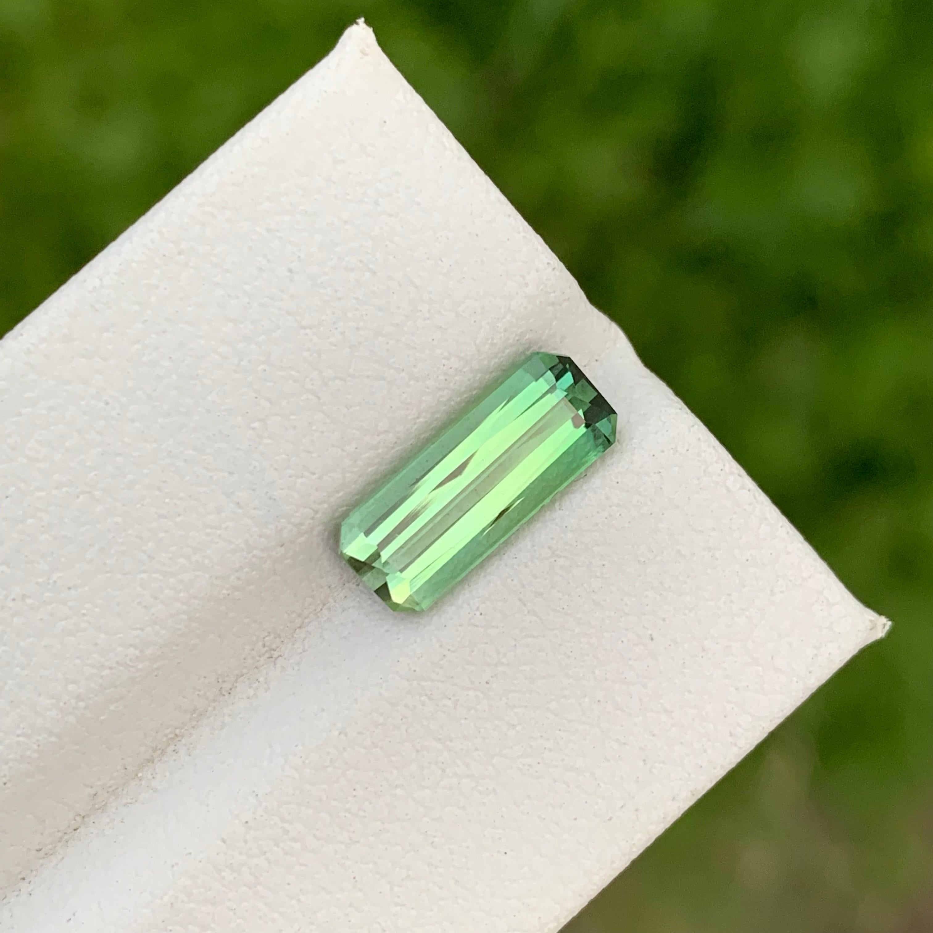 Loose Tourmaline 
Weight: 2.25 Carats
Dimension: 12.1x4.8x4.1 Mm
Origin: Kunar Afghanistan 
Shape: Emerald 
Treatment: Non
Color: Light Green 
Treatment: Non
Certificate: On Client Demand
Tourmaline is a gemstone with a remarkable spectrum of