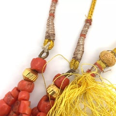 Gorgeous 22K yellow gold and round natural coral beads long necklace.