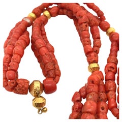 Gorgeous 22K yellow gold and round natural coral beads long necklace.