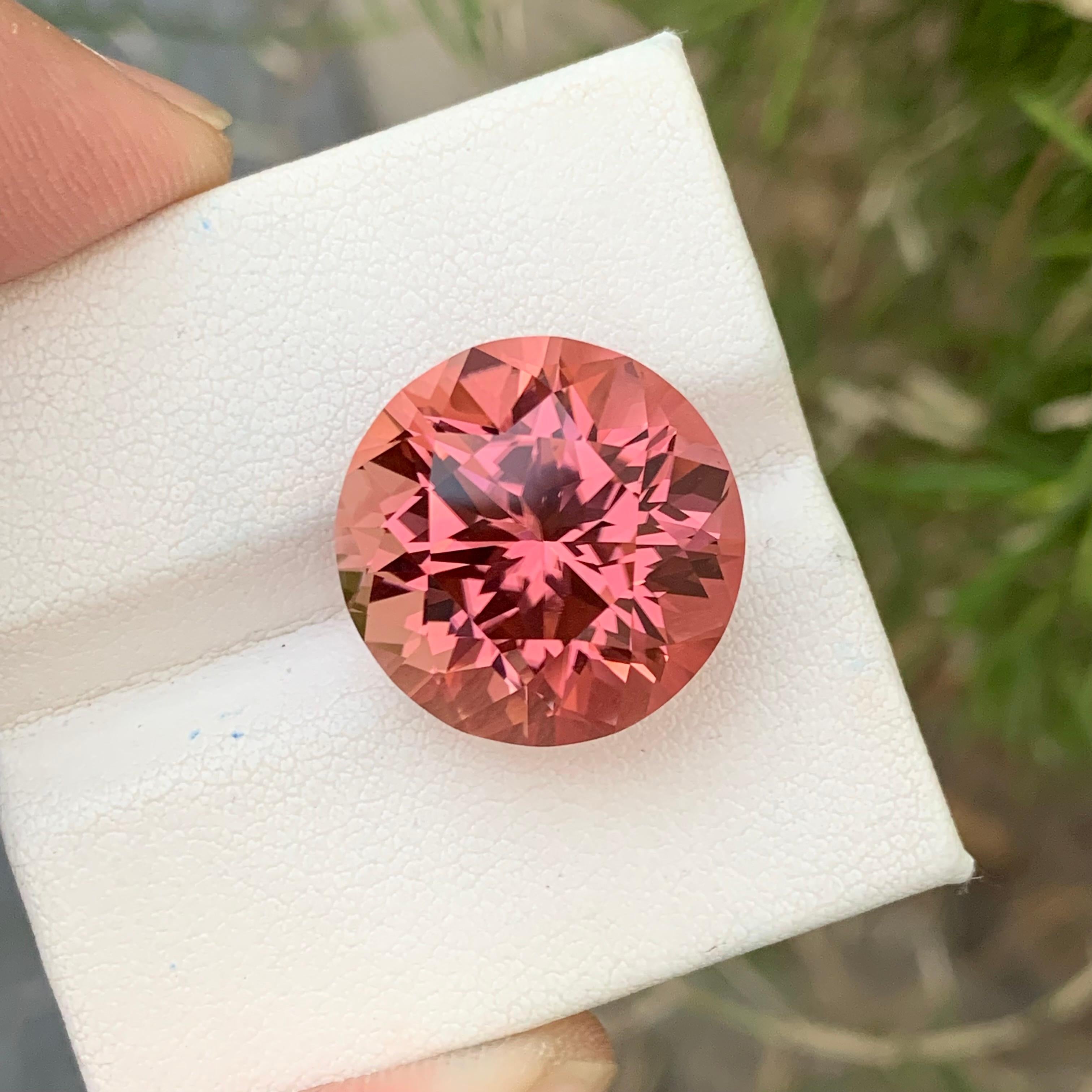 Loose Tourmaline 
Weight: 23.15 Carats 
Dimension: 18x18x12.9 Mm
Origin: Afghanistan 
Shape: Round 
Color: Pink
Treatment: Non
Certificate: On Demand 
Pink tourmaline, also known as rubellite, is a captivating gemstone cherished for its delightful