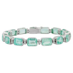 Wunderschöne 33,58 Ct. Smaragd-Diamant-Hochzeits-Tennisarmband für Sie in 18K Gold
