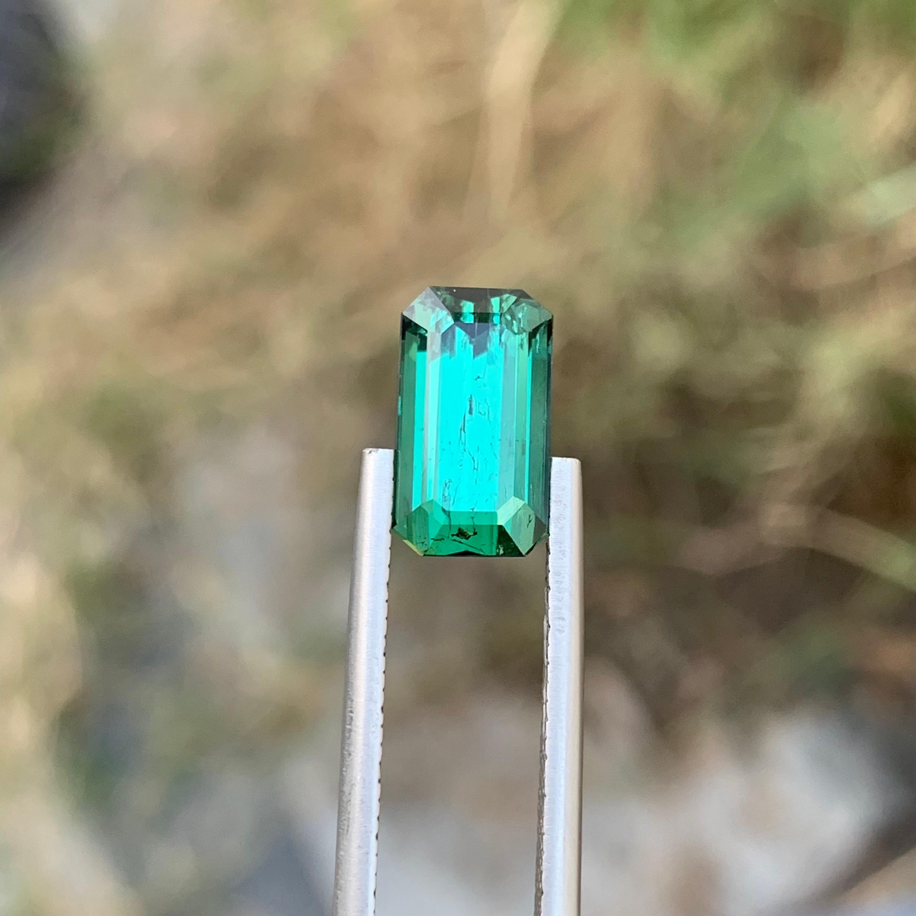 Faceted Tourmaline 
Weight: 3.70 Carats 
Dimension: 11.5x6.5x5.6
Origin: Kunar Afghanistan 
Shape: Emerald 
Color: Greenish Blue
Treatment: Natural 
Certificate: On Customer Demand 
Lagoon tourmaline, a captivating variety of the tourmaline