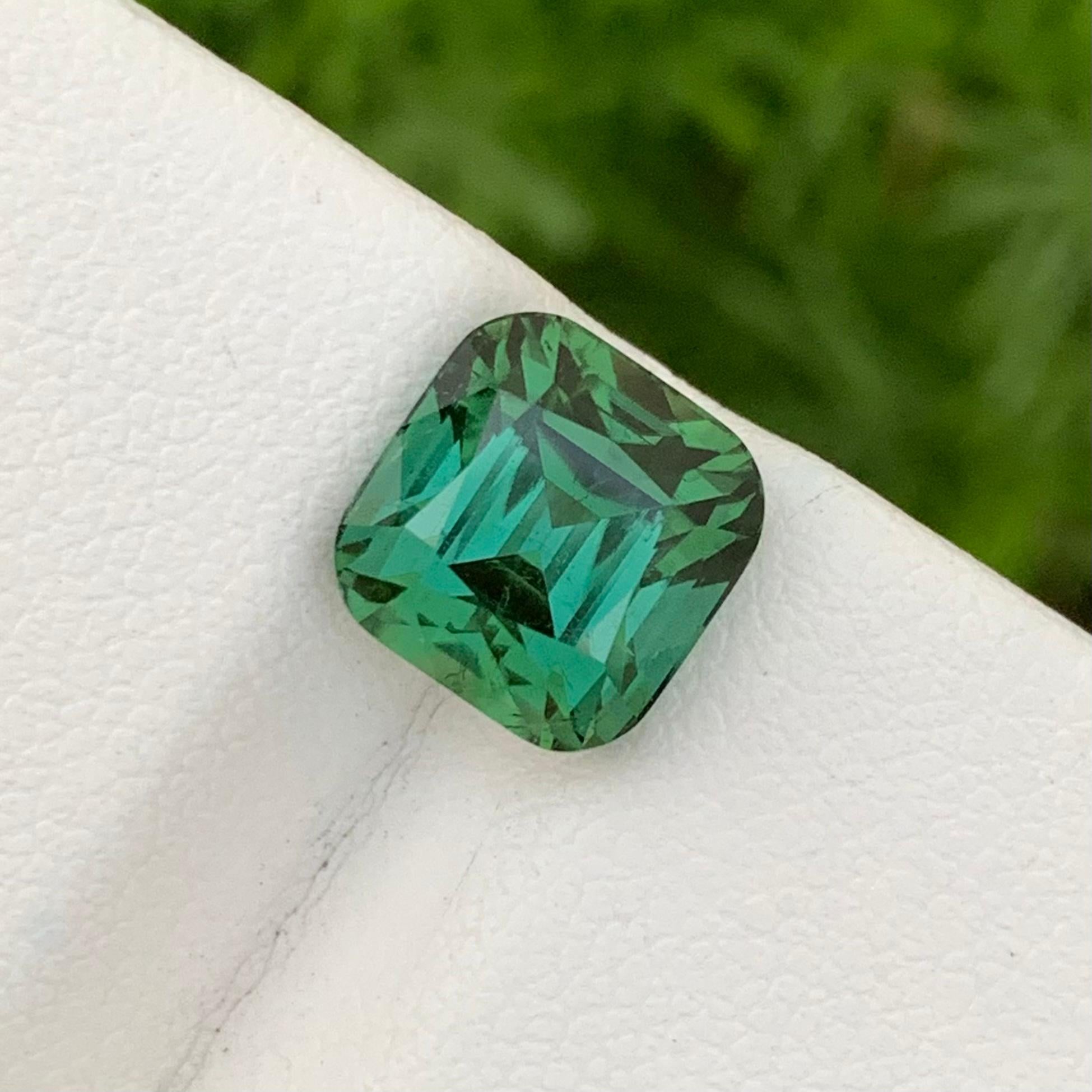 Faceted Tourmaline 
Weight: 4.80 Carats 
Dimension: 8.9x8.7x7.8 Mm 
Origin: Afghanistan 
Color: Blueish Green 
Shape: Cushion Cut
Treatment: Non
Certificate: On Customer Demand 
.
Lagoon tourmaline, also known as 