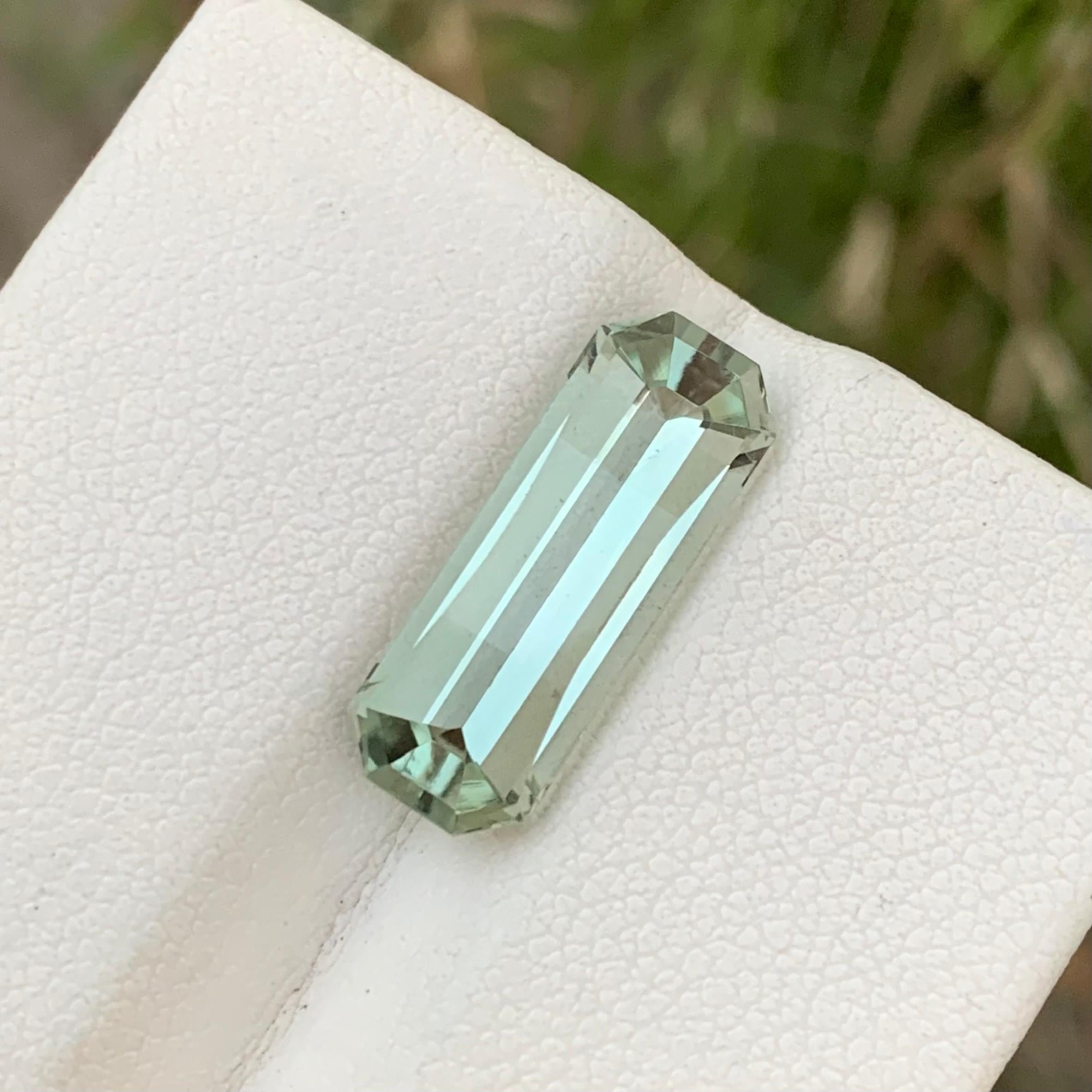 Loose Amethyst 
Weight: 5.70 Carats 
Dimension: 18.5x7x6.1 Mm
Origin: Brazil
Shape: Emerald
Cut: Pixel Cut / Pixelated Cut / Smith Bar Cut
Treatment: None
Certificate: On Demand
Prasiolite, commonly known as green amethyst, is a captivating gemstone