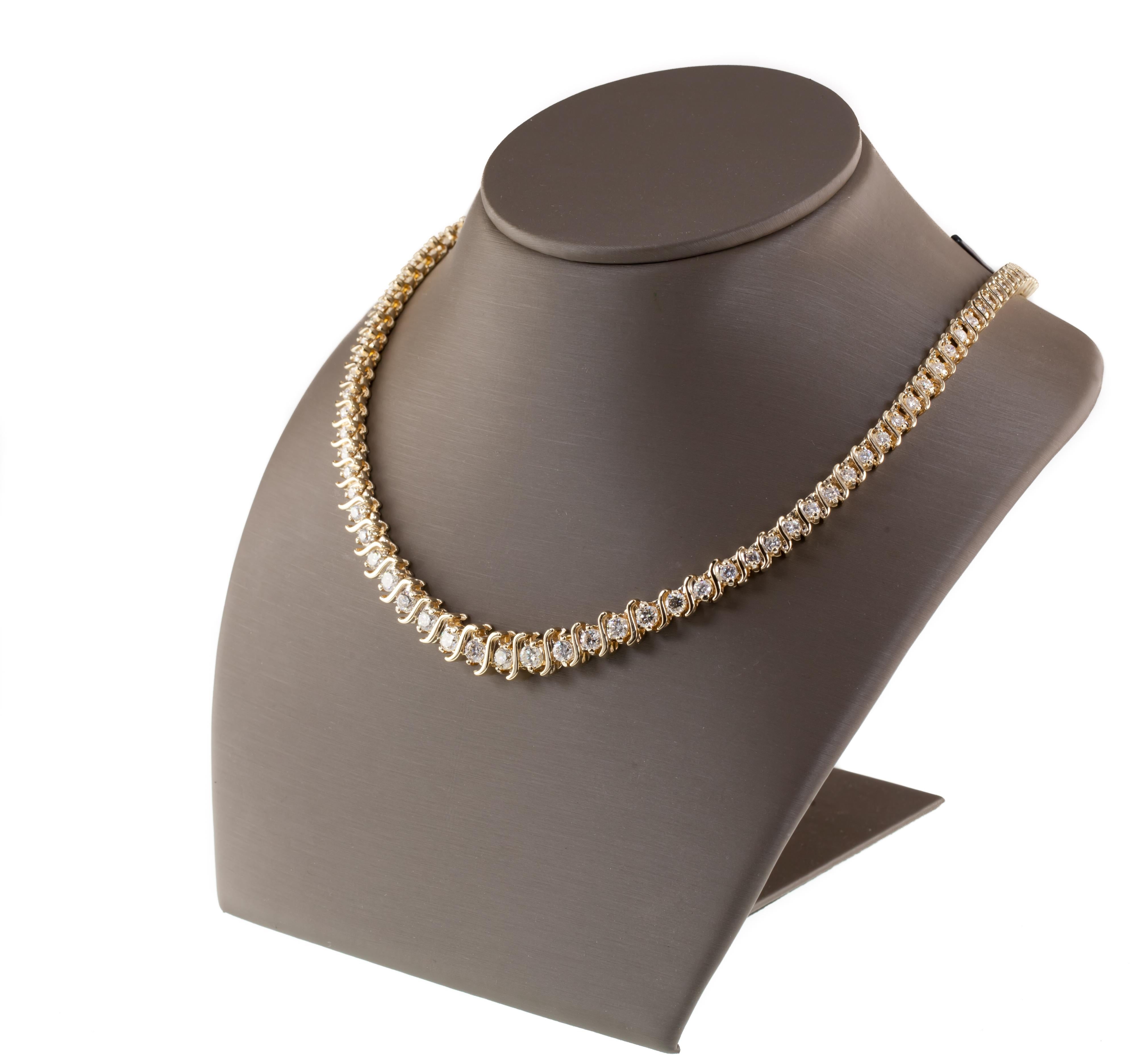 Gorgeous Tennis Necklace
Features Two-Prong Set Graduated Round Diamonds Separated by Yellow Gold 