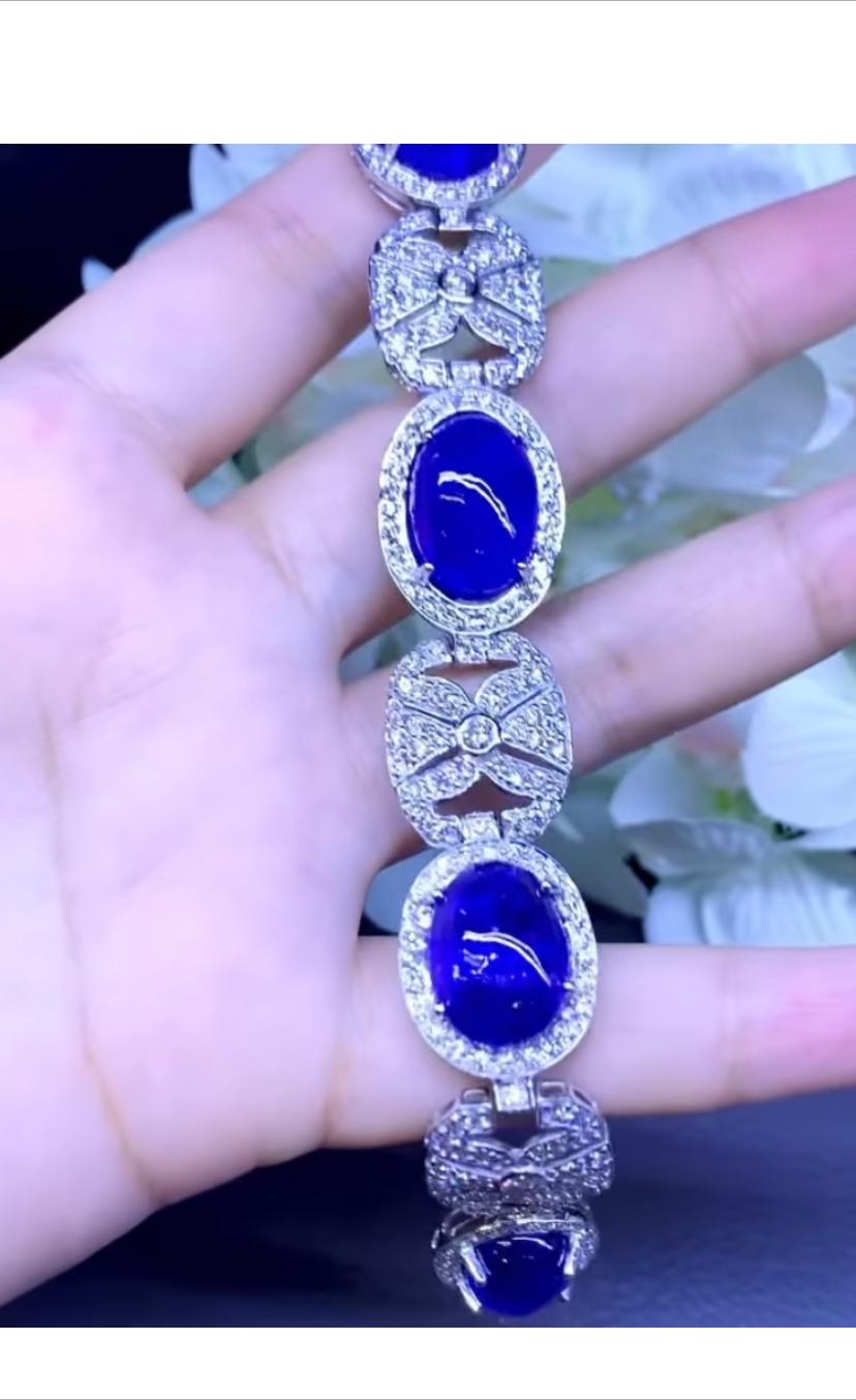 Art Deco Gorgeous 62, 90 Carats of Tanzanites and diamonds on bracelet in gold 
