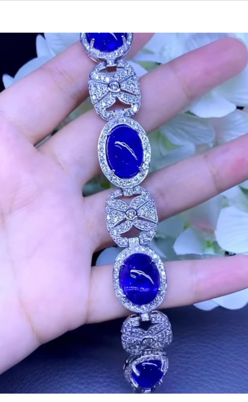 Cabochon Gorgeous 62, 90 Carats of Tanzanites and diamonds on bracelet in gold 