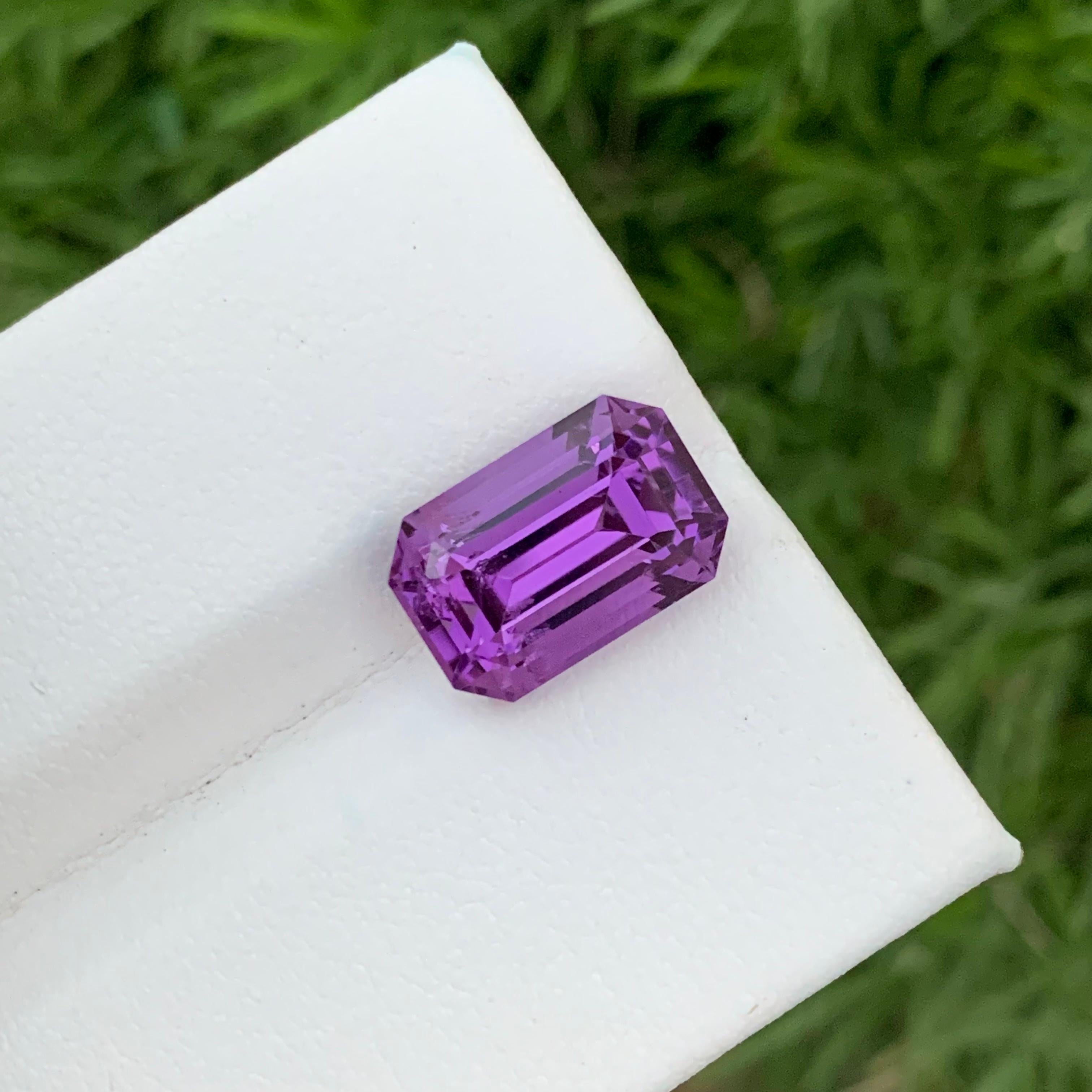 Faceted amethyst 
Weight: 6.85 Carats 
Dimension: 13.2x8.8x8.2 Mm
Origin: Brazil
Color: Purple
Shape: Emerald 
Certificate: On Customer Demand 
Amethyst is a stunning violet gemstone that has captivated human civilization for centuries. Its name is