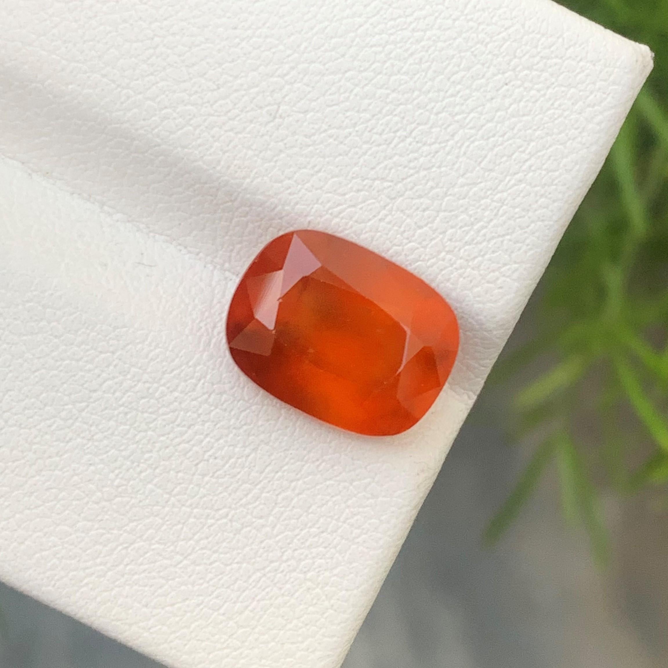 Gemstone Type : Hessonite Garnet
Weight : 6.95 Carats
Dimensions : 12.3x9.5x7.1 Mm
Origin : Africa
Clarity : Smoky 
Shape: Long Cushion
Color: Fanta Orange
Certificate: On Demand
Birthstone: January Month
According to Vedic astrologists, wearing a