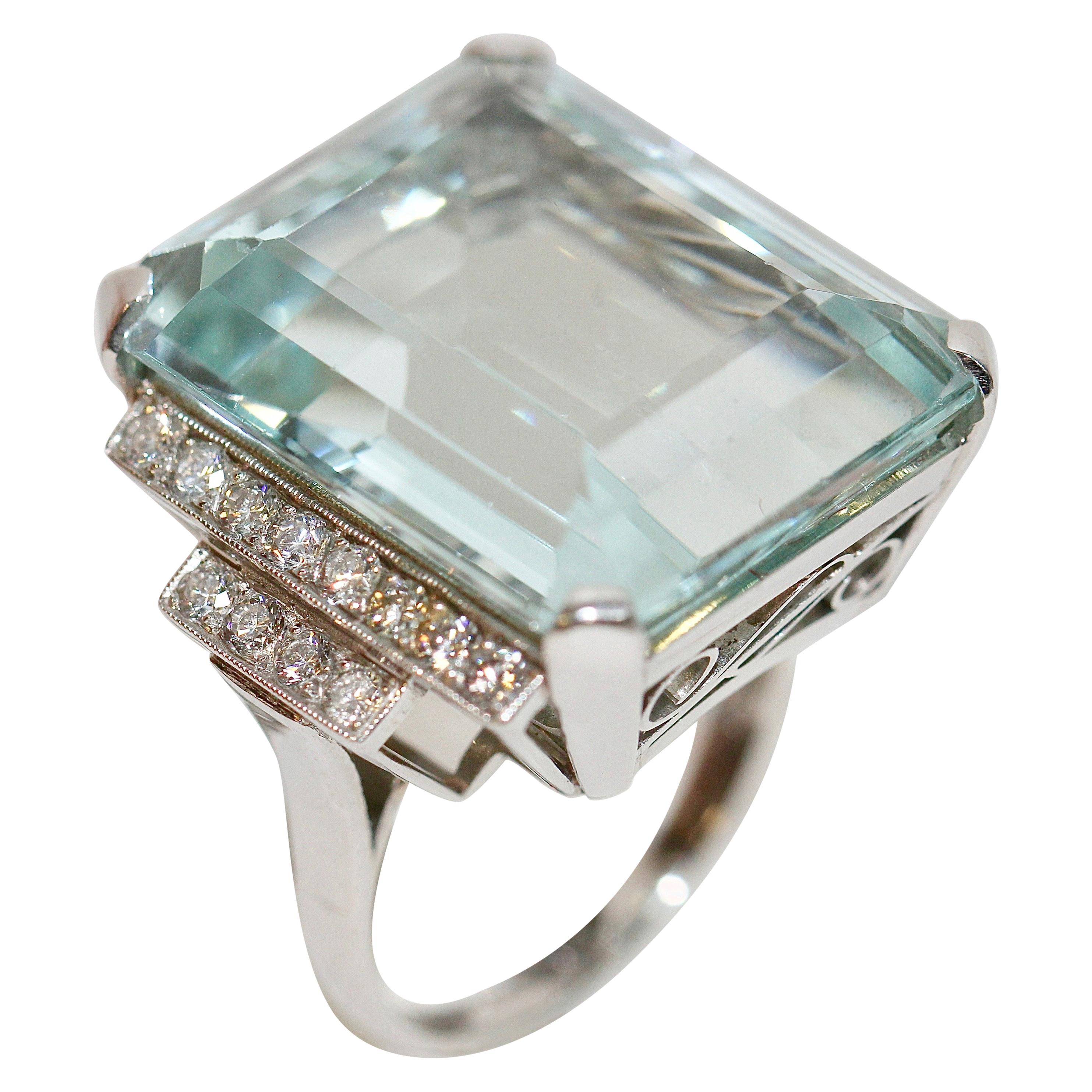 Gorgeous 950 Platinum Ring with Large 34.8ct Faceted Aquamarine and 24 Diamonds For Sale