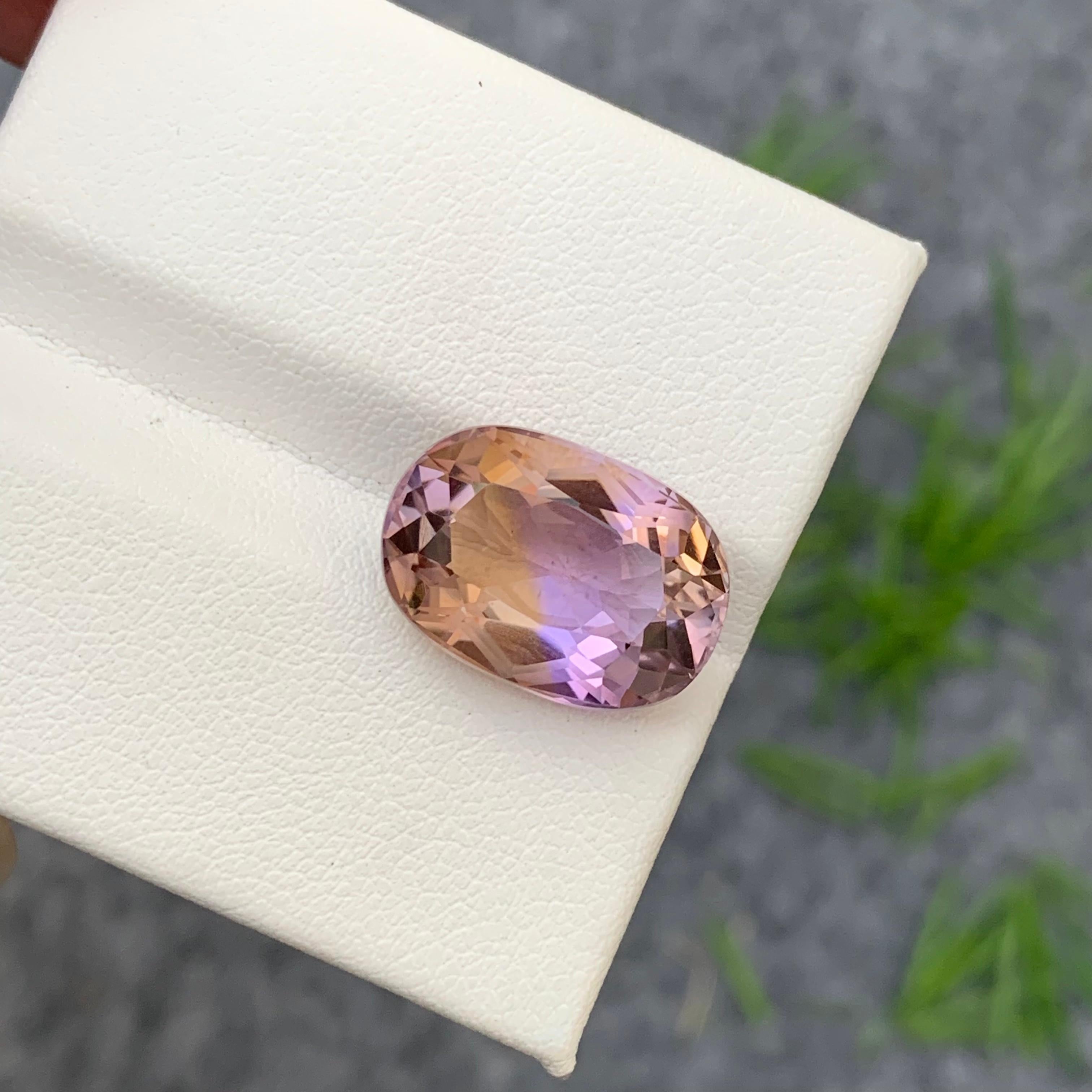 Faceted Ametrine 
Weight: 9.95 Carats 
Dimension; 16.1x11.3x8.6 Mm
Origin: Brazil
Color: Purple & Yellow 
Shape: Oval
Treatment: Non
Certficate: On Demand 
.
Ametrine is a unique and captivating gemstone that displays a harmonious blend of two