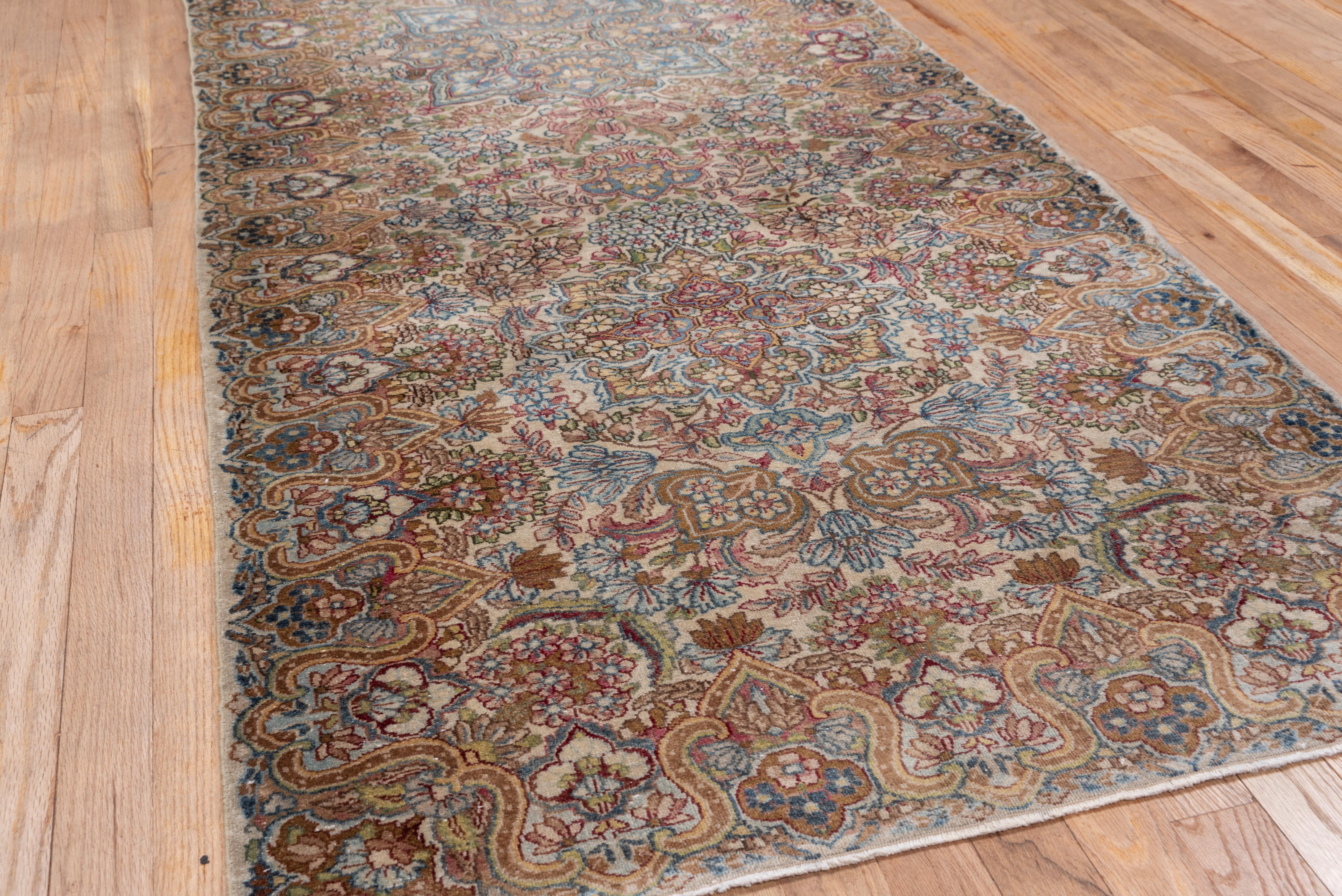 Hand-Knotted Gorgeous Antique Persian Kerman Runner with Jewel Tones, circa 1920s