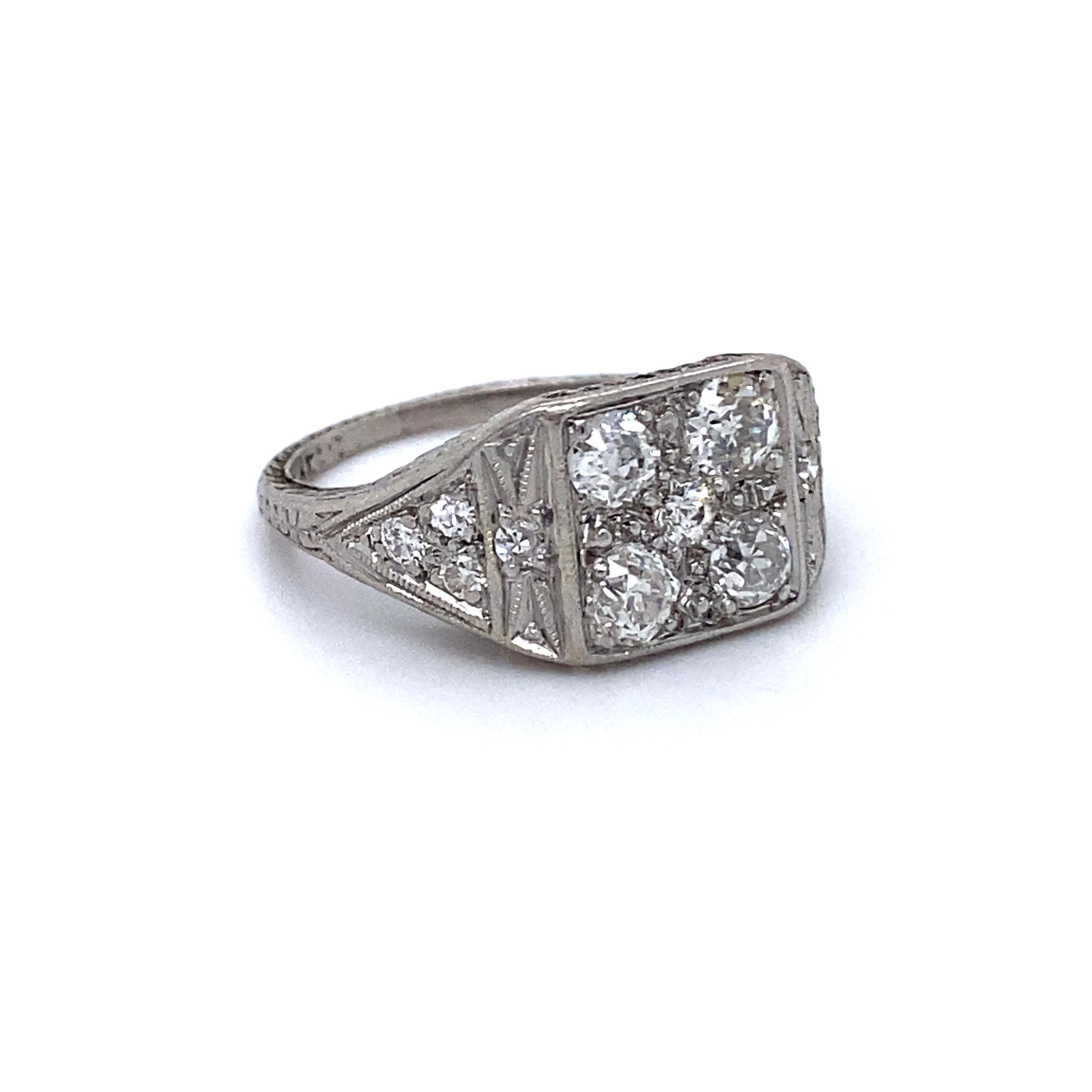 This Antique Cluster Ring is a gorgeous classic! Crafted in Platinum, the design features a wonderful cluster of Pave Set Diamonds, finished with lovely floral garland sides. There are a total of 13 Antique Cut Diamonds, totaling approximately
