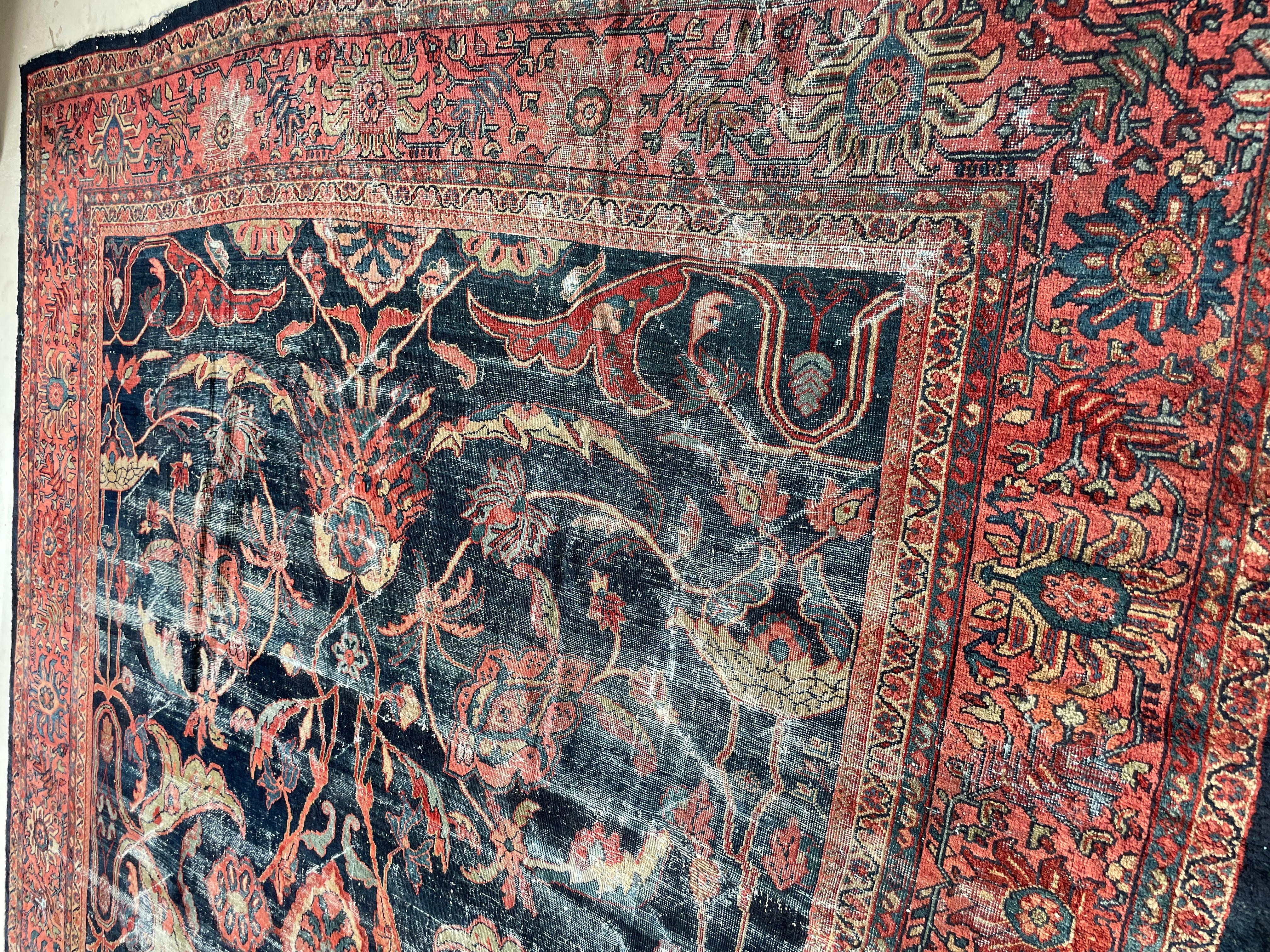 gorgeous distressed arabesque antique Persian Mahal with large spirling root & vine motif in magnificent color combination 

Size: 10.4 x 14

Age: Antique; C. 1910-1920's

Pile: Low with sensational age-related wear and patina with both