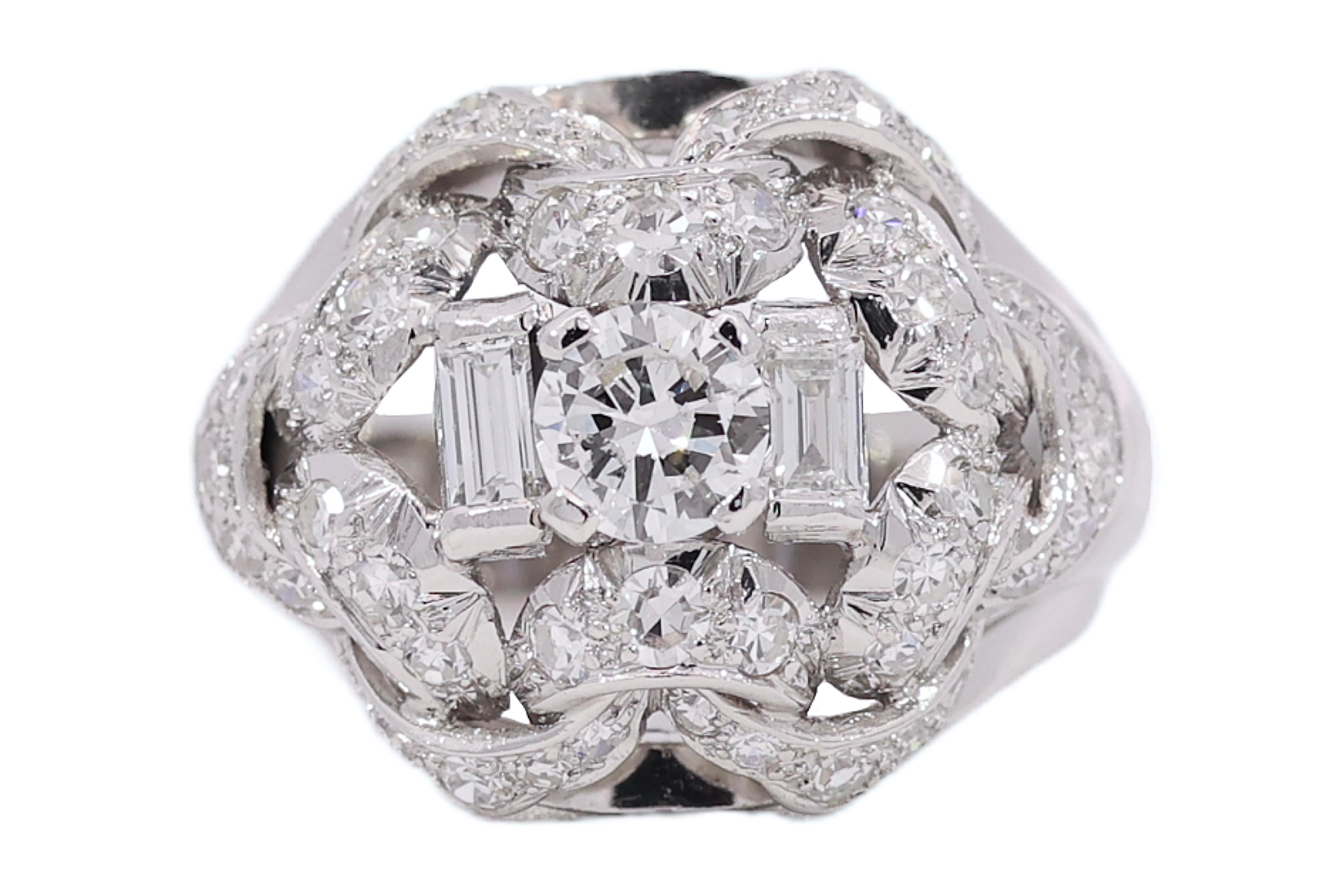 Gorgeous Art Deco Platinum Ring with Approx. 1.54 ct. Diamonds 

Diamonds: Round cut centre diamond approx. 0.50 ct. 
baguette cut diamonds together approx. 0.28 ct.
Surrounded eight cut diamonds, together approx. 0.76 ct.

Material: Platinum

Ring