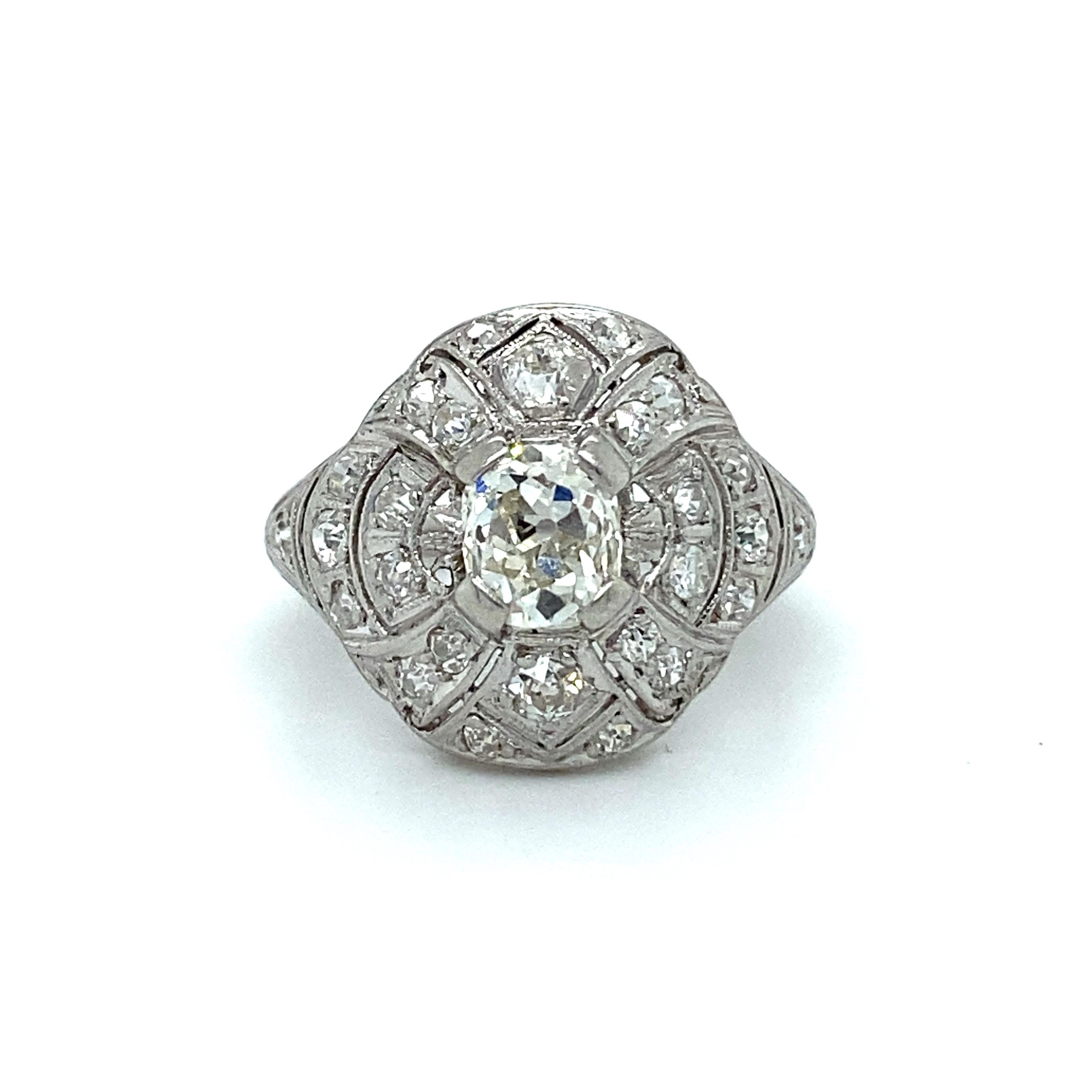 So so gorgeous! This special sparkly Art Deco antique is really a sight to behold! Crafted in Platinum, this antique style of ring features an intricate Deco openwork further studded with Pave Set Diamonds and lovely beaded edges!  In the center,