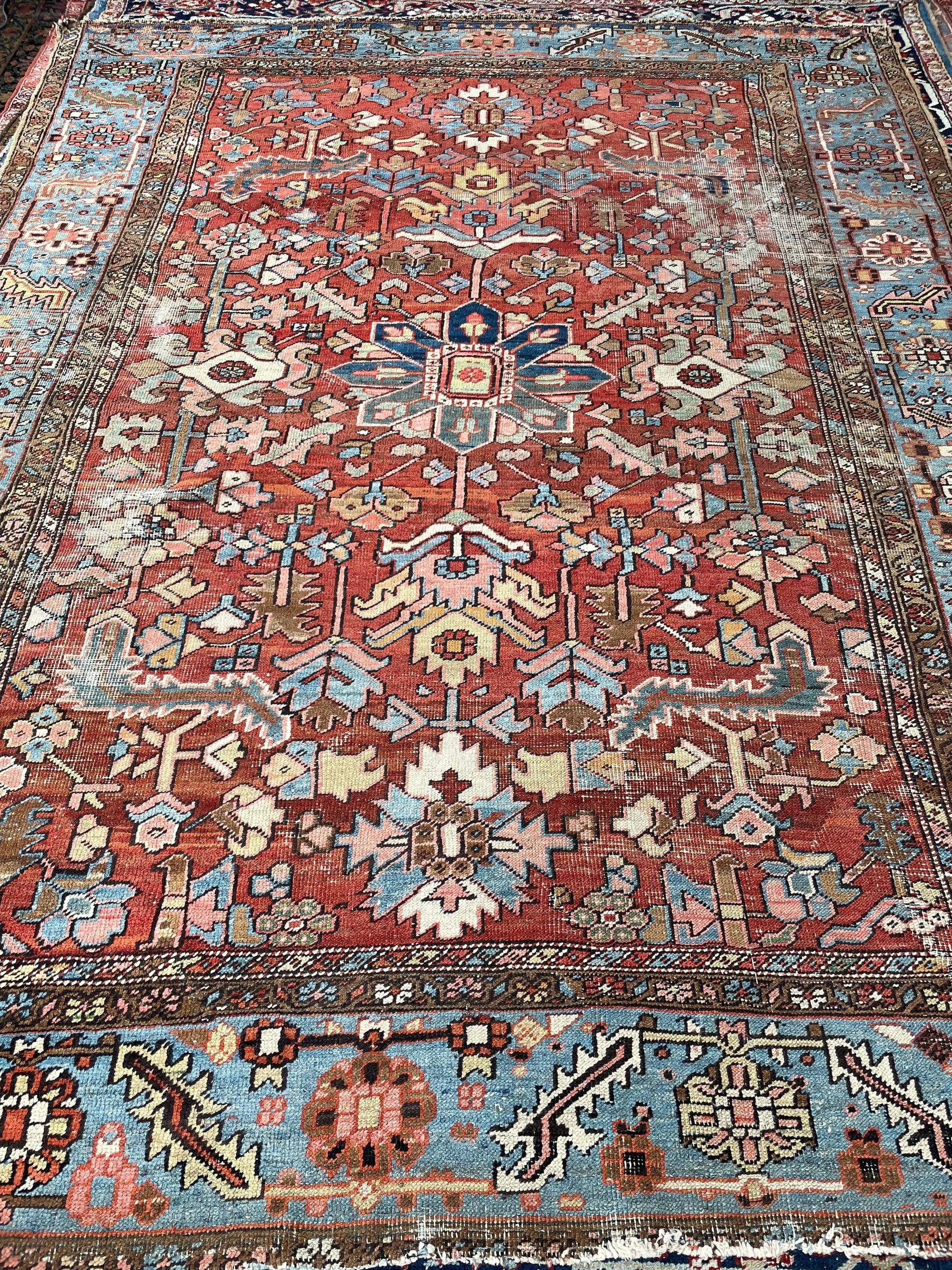 Gorgeous Blooming Jungle Antique rug Rusts, Sunflower, Ice Blue, Salmon, Pinks, Greens

About: It's funny because there is a new saying in the rug world; bad rugs photograph well, good rugs photograph poorly. Cameras help inferior rugs look better