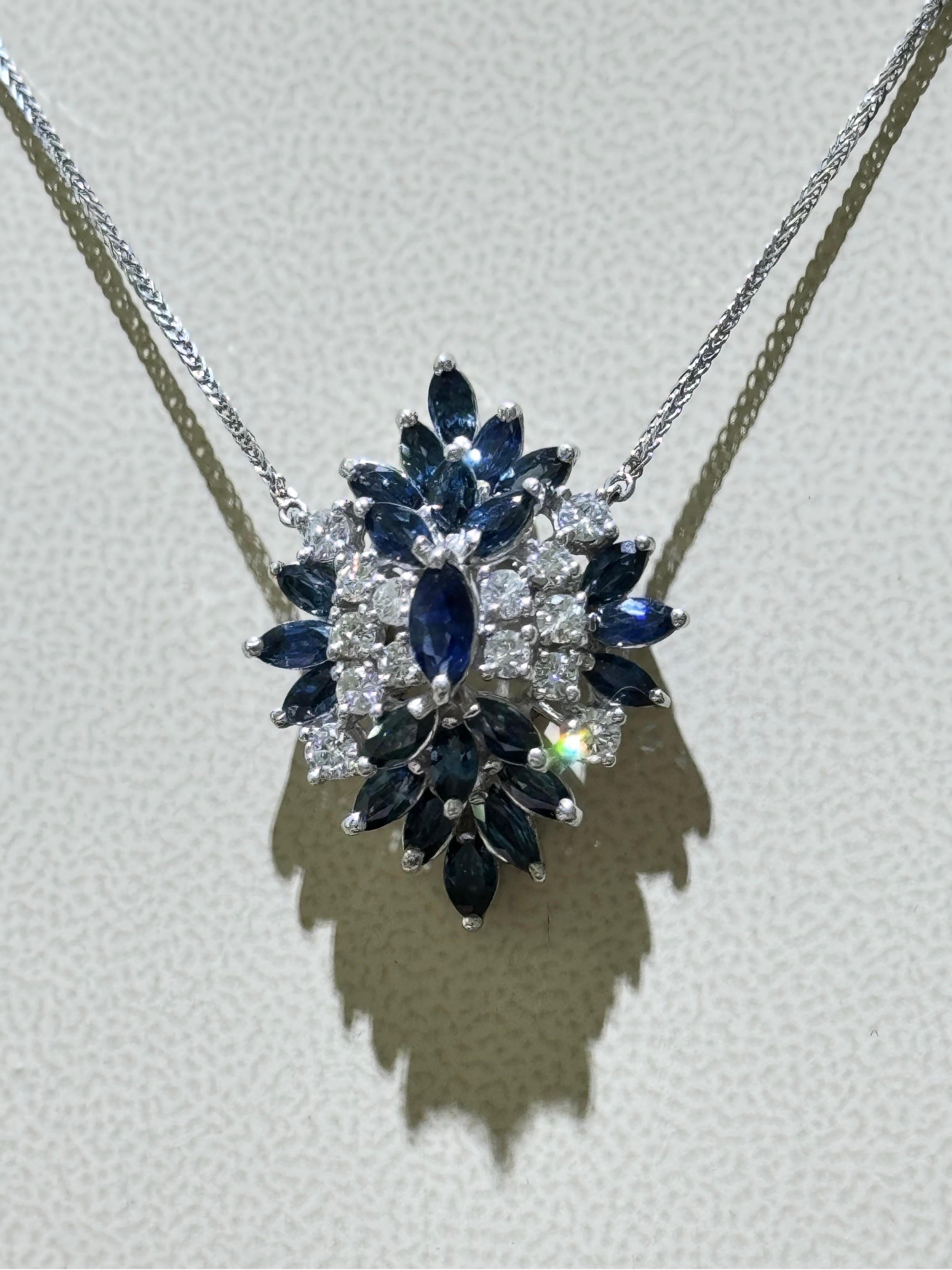 Gorgeous Blue Sapphire And Diamond Necklace In 14k White Gold ,

Chain is 18k white gold 18” long,

Pendant is in 14k white gold, approximately 1 1/4” long.

Approximately 1.4 carats in diamonds.