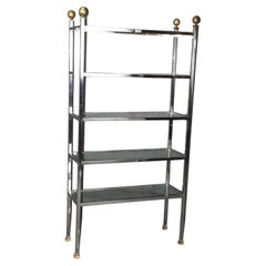 Splendida libreria Etagere in ottone e acciaio attribuita alla Maison Jansen