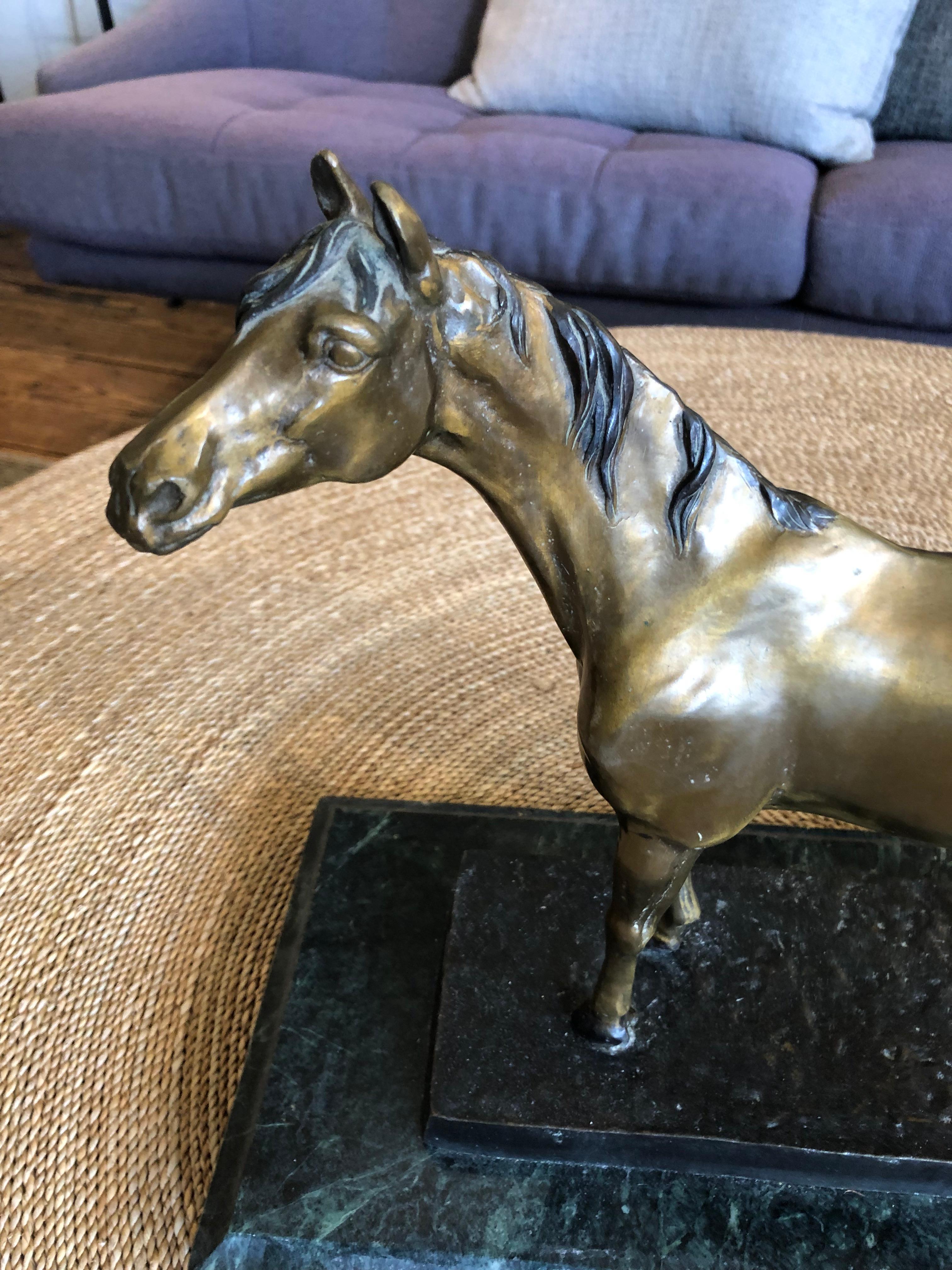 Gorgeous bronze sculpture of a horse mounted on marble by  Cyrus Dallin (1861-1944) , a celebrated Utah-born sculptor, educator, and Indigenous rights advocate who lived and worked in Arlington, Massachusetts for over 40 years. Dallin’s public