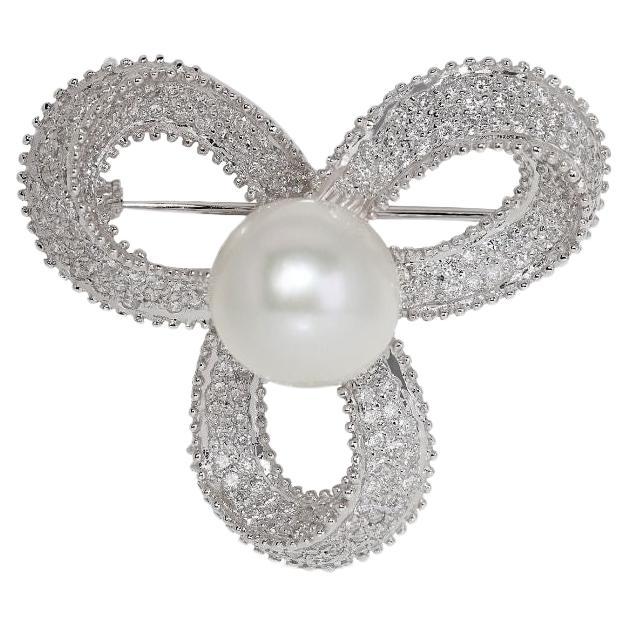 Gorgeous Brooch with Pearl Center Stone and Diamonds For Sale