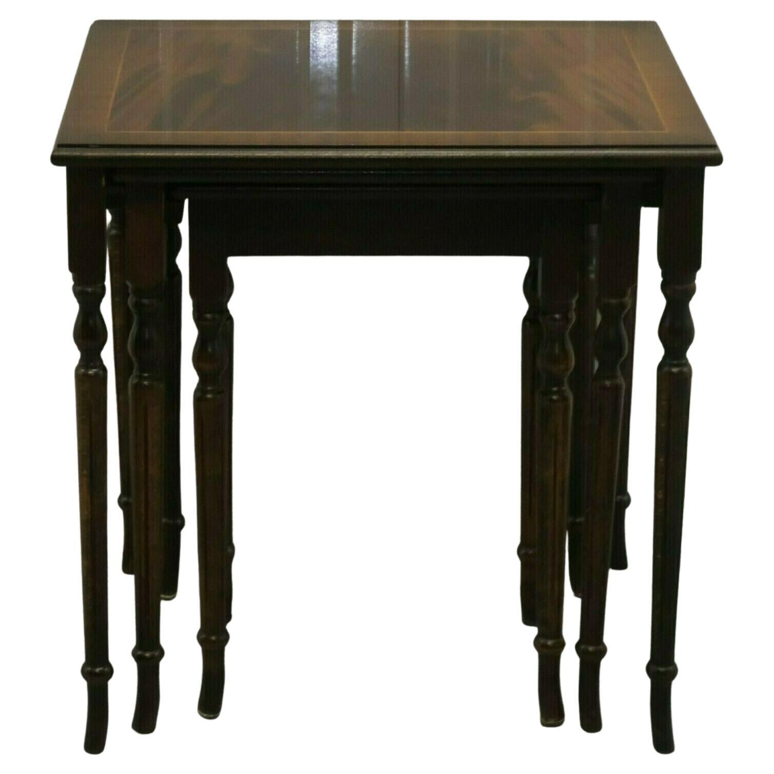We are delighted to offer for sale this gorgeous mahogany brown nest of tables standing on beautiful fluted legs.

These tables are not only very versatile but also very pretty pieces of furniture to look at. They can be used for small drinks