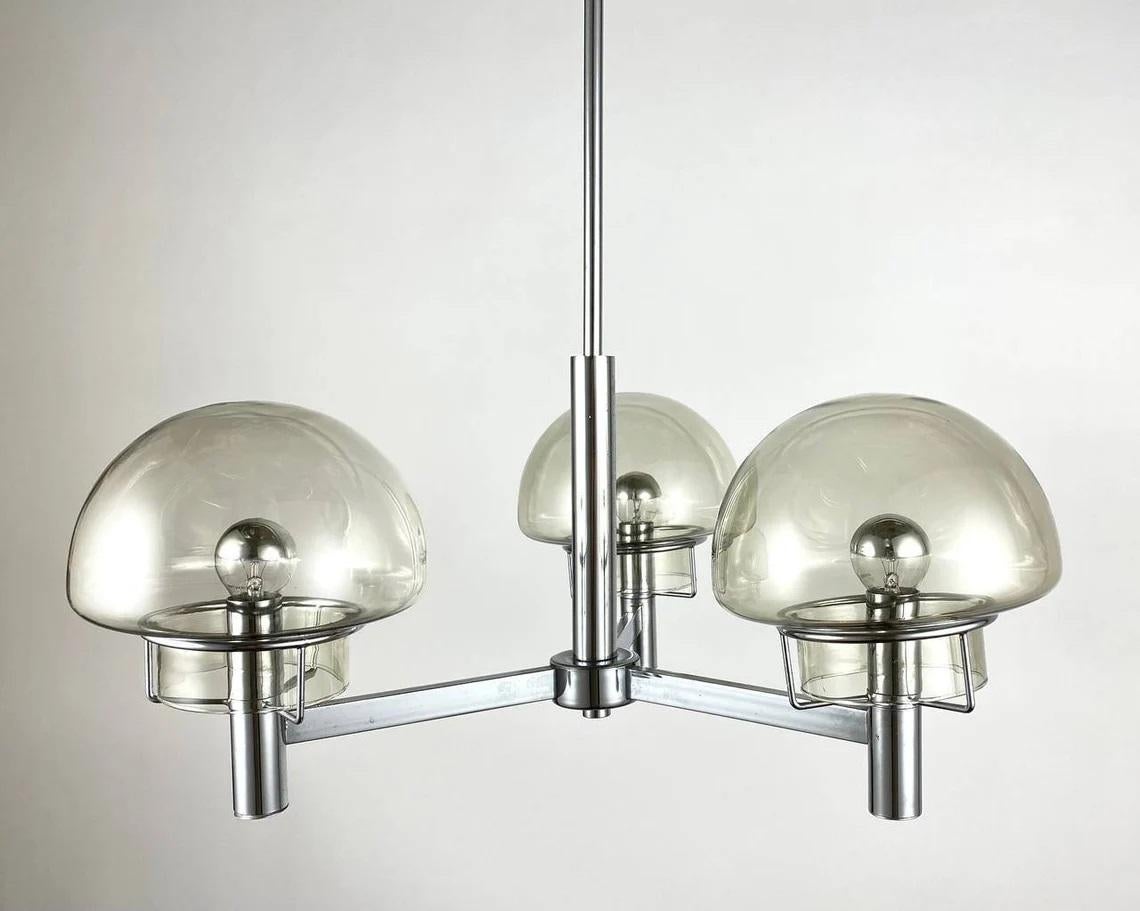 A Beautiful and Stylish Model from the Italian brand Stilnovo, 1970s.

The Pendant Fixture is made of metal silver colored frame with three horns on which glass shades in the form of hemispheres are installed.

Shades of glass will practically