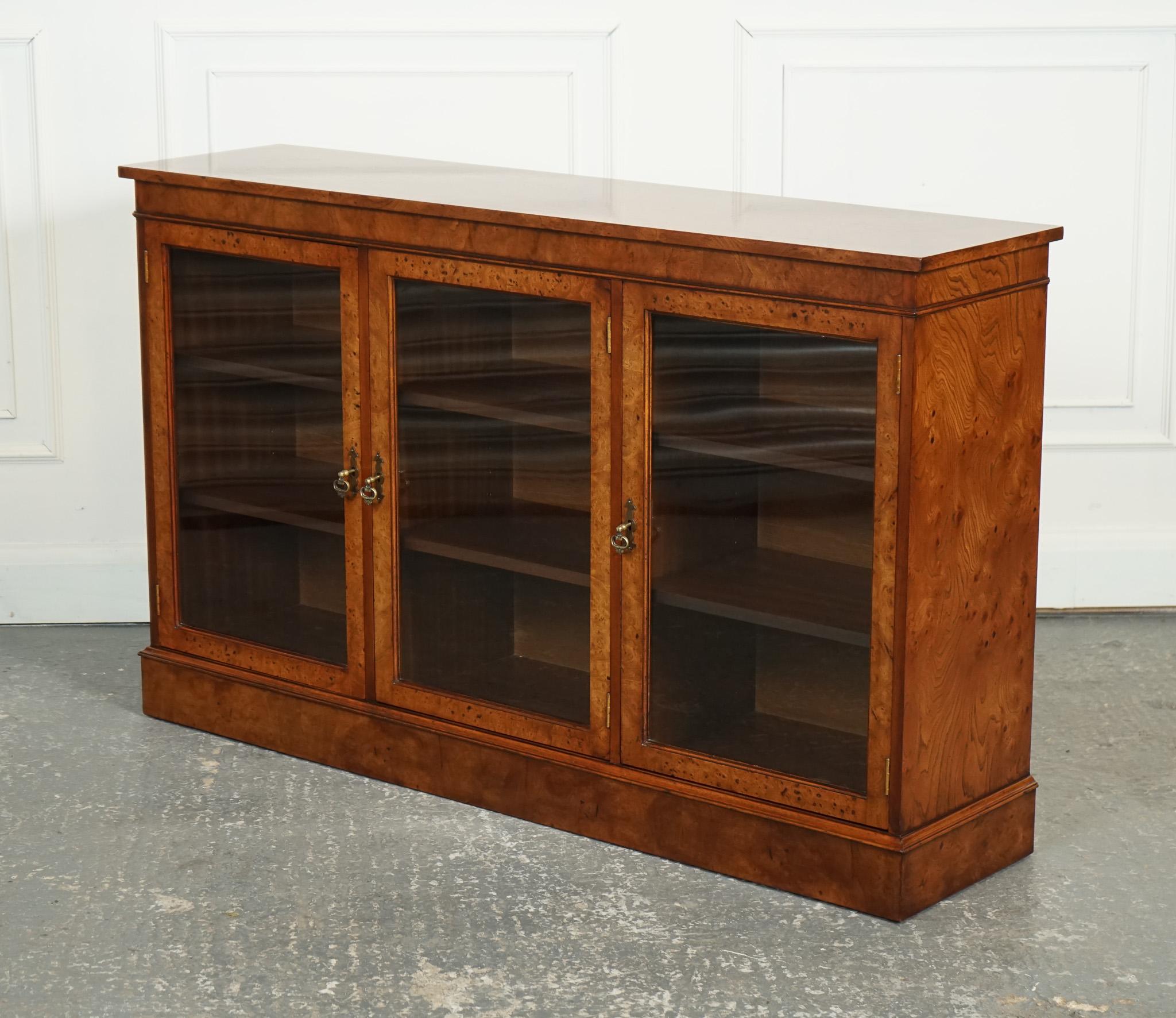 

We are delighted to offer for sale this Gorgeous Burr Walnut Bookcase.

A gorgeous burr walnut glazed bookcase display cabinet is a true showstopper that effortlessly blends functionality with exquisite craftsmanship and aesthetic appeal. This