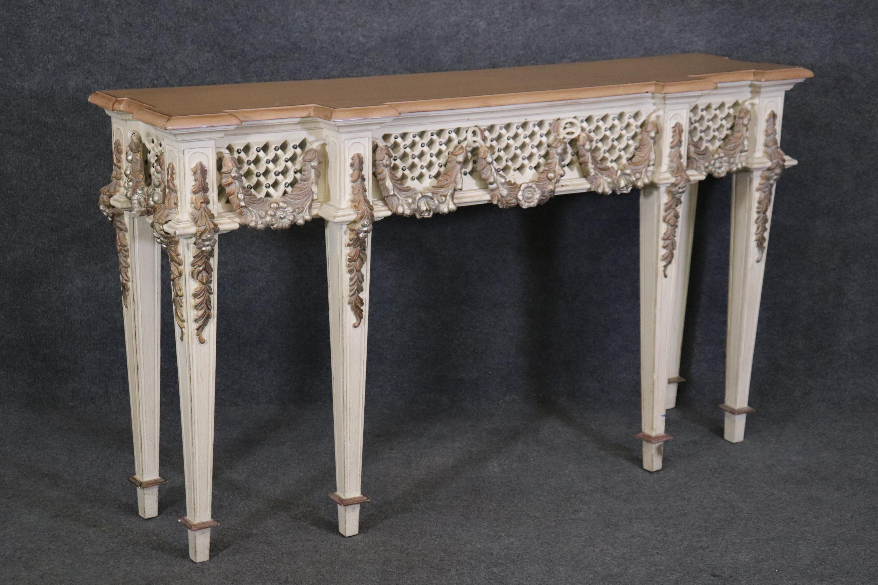 This is a fantastic heavily carved console table and is ready to go. The table measures 35 tall x 61.25 wide x 16.25 deep. Dates to the 1960s era. 





We can help with shipping to the ground floor or elevator buildings if requested prior to