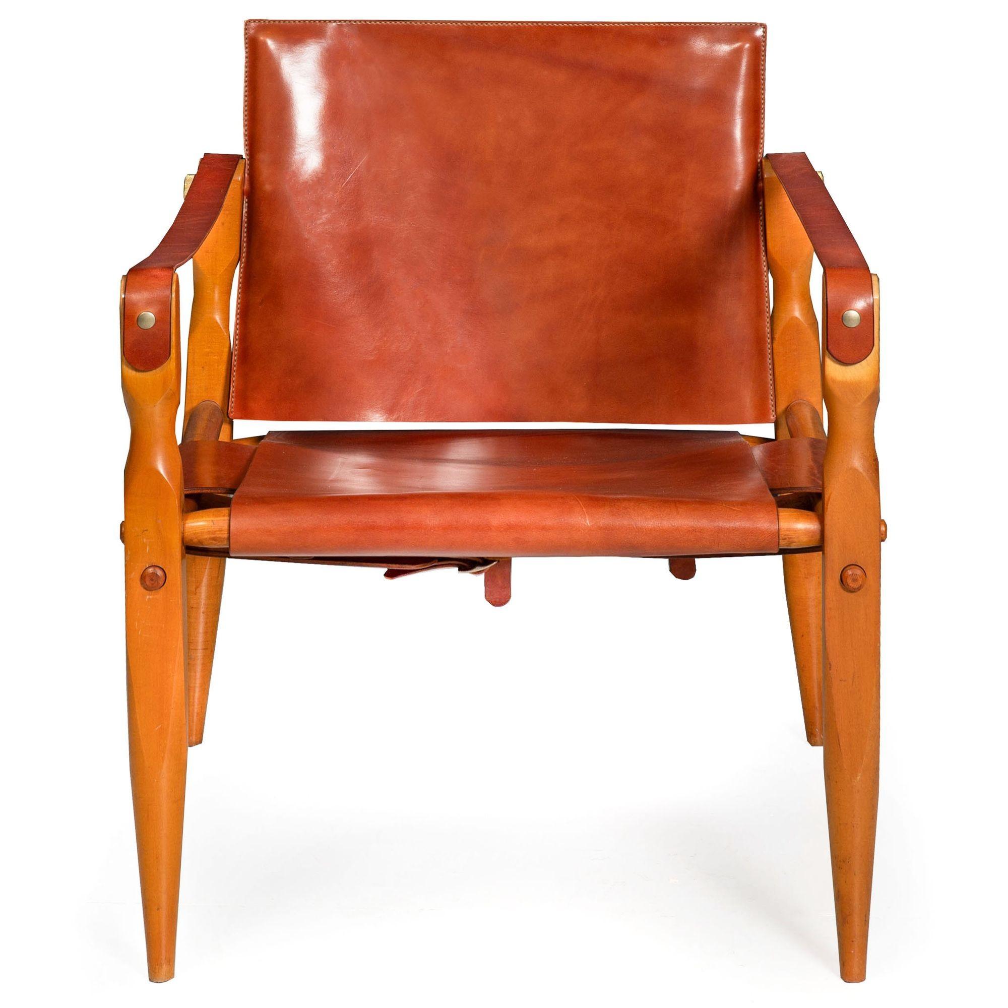 SCANDINAVIAN MODERN MAPLE & LEATHER SAFARI CHAIRS ATTRIBUTED TO WILHELM KIENZLE
Circa 1970  unmarked  brand new expertly crafted leather and custom machined hardware  a pair to this chair may still remain available
Item # 306YRC27L-2

An absolutely