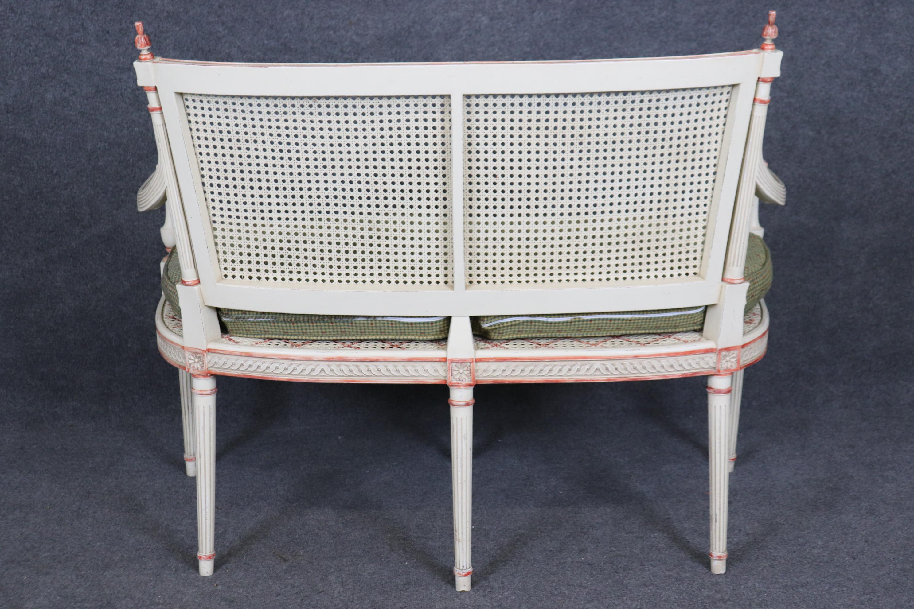 French Gorgeous Creme Paint Decorated and Green Upholstered Cane Louis XVI Settee For Sale