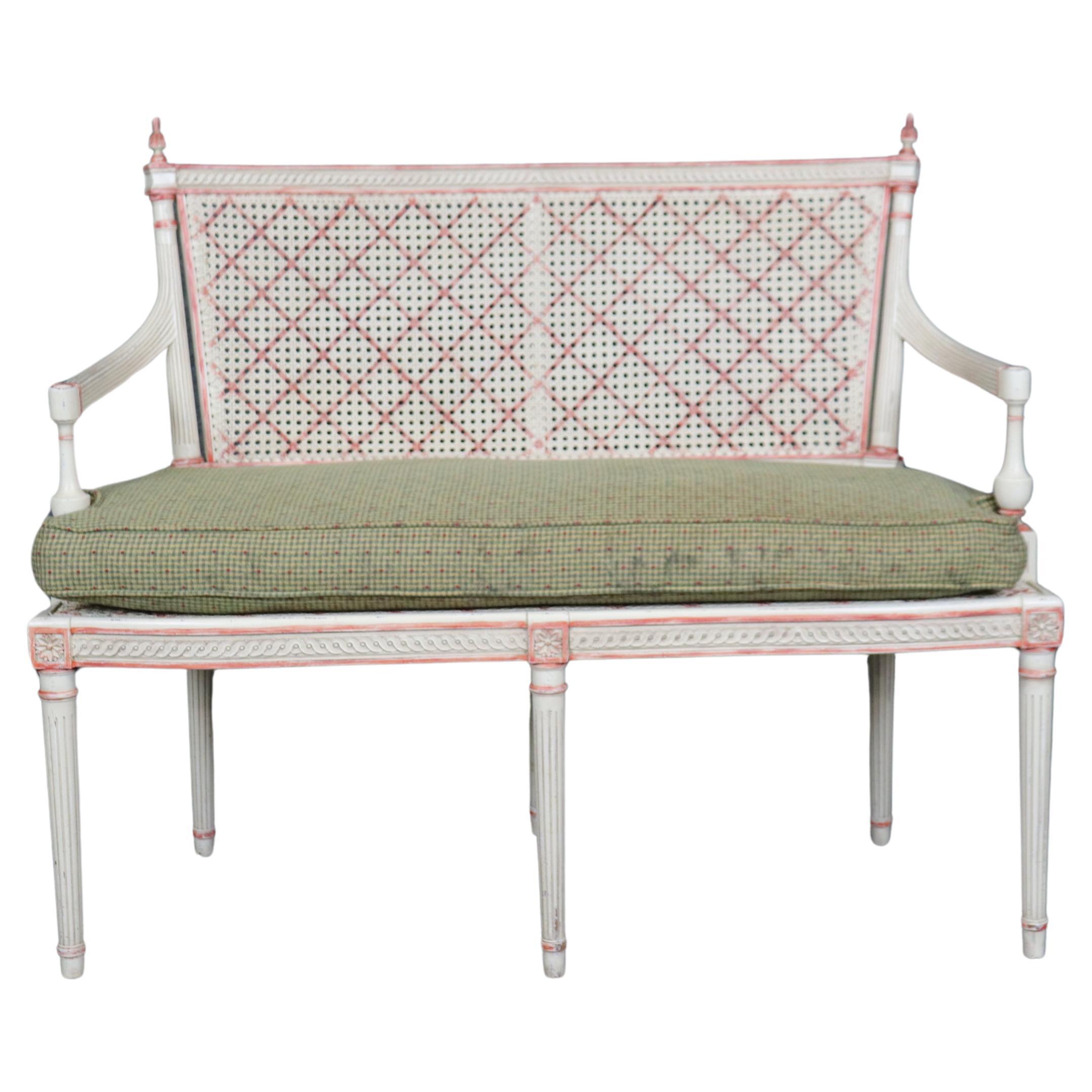 Gorgeous Creme Paint Decorated and Green Upholstered Cane Louis XVI Settee For Sale