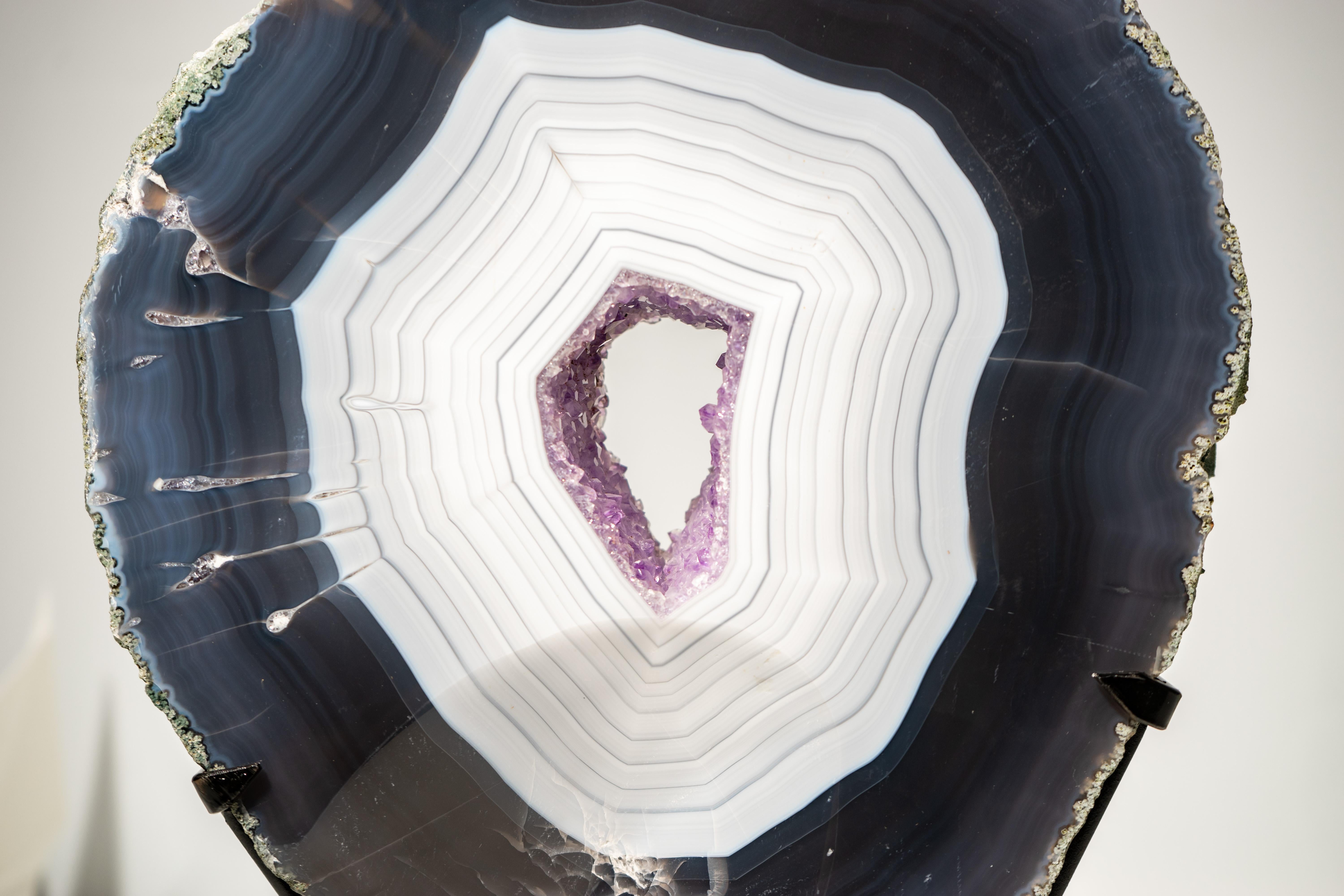 Rare Natural Artwork: Rare Blue and White Lace Agate Geode with Striped Patterns, All-Intact

Description

Brazil is one of the world’s top producers of agate, and occasionally a geode like this one is unearthed. This rare agate slice combines