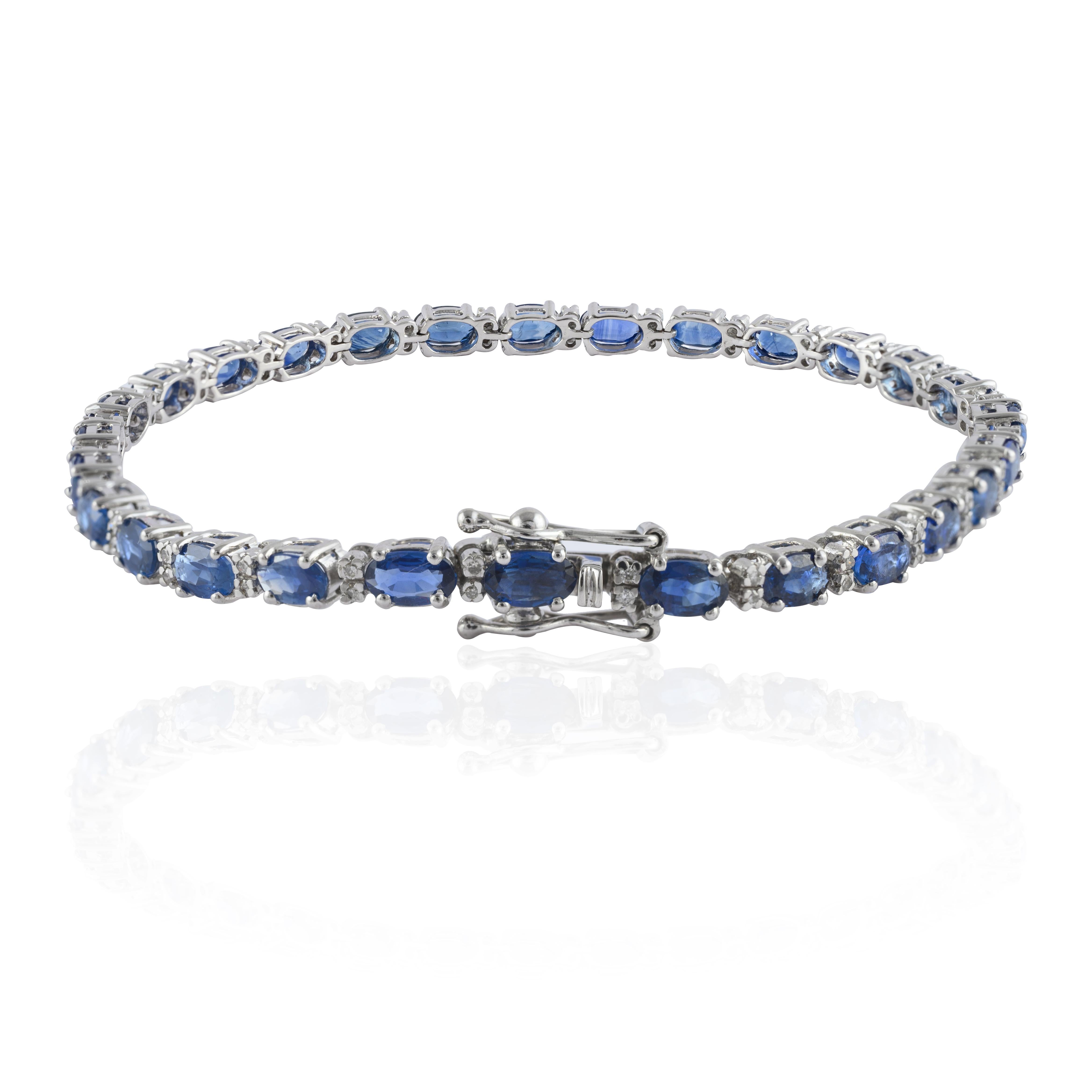 This Diamond Sapphire Tennis Bracelet in 14K Gold showcases 28 endlessly sparkling natural sapphires, weighing 7.7 carat. It measures 7 inches long in length. 
Sapphire stimulates concentration and reduces stress. 
Designed with perfect oval cut