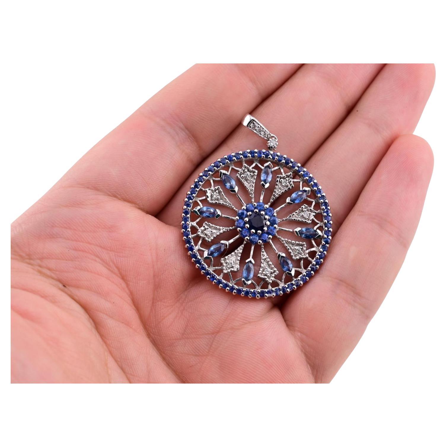This stunning Effy pendant is a remarkable piece for any jewelry enthusiast. Crafted from 14k gold, the pendant showcases a captivating circular design. The centerpiece features vibrant blue sapphires, elegantly arranged to draw the eye. Surrounding