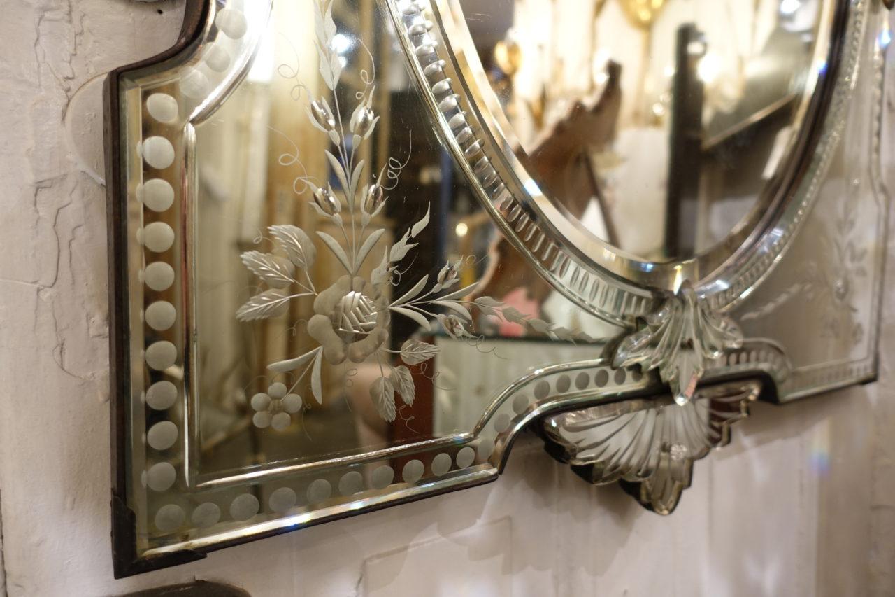 Beautiful vintage Venetian mirror, with a stunning regal faceted mirrored glass frame, especially the top and base. and wonderful etched beaded handiwork and the decorative floral and foliage designs.