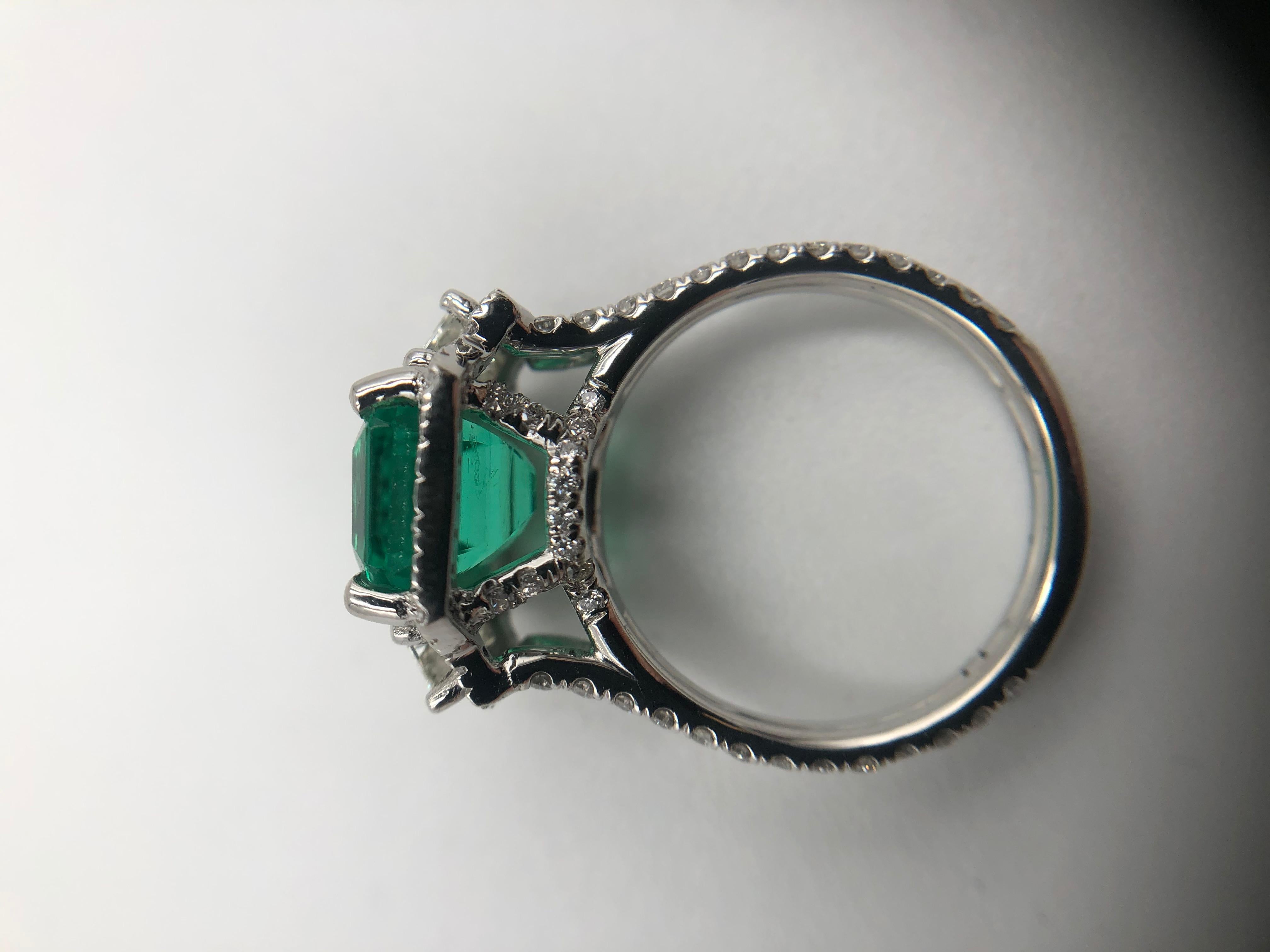 -Gorgeous Emerald and Diamond Ring in Platinum
-Emerald: AGL, Rectangular, 2.94 ct, 9.48x7.20x5.86 mm
-Trapezoid Diamonds: .45 ct FVS1
-Round Diamonds: 1.00 ct FVS1
-Size: 4.25