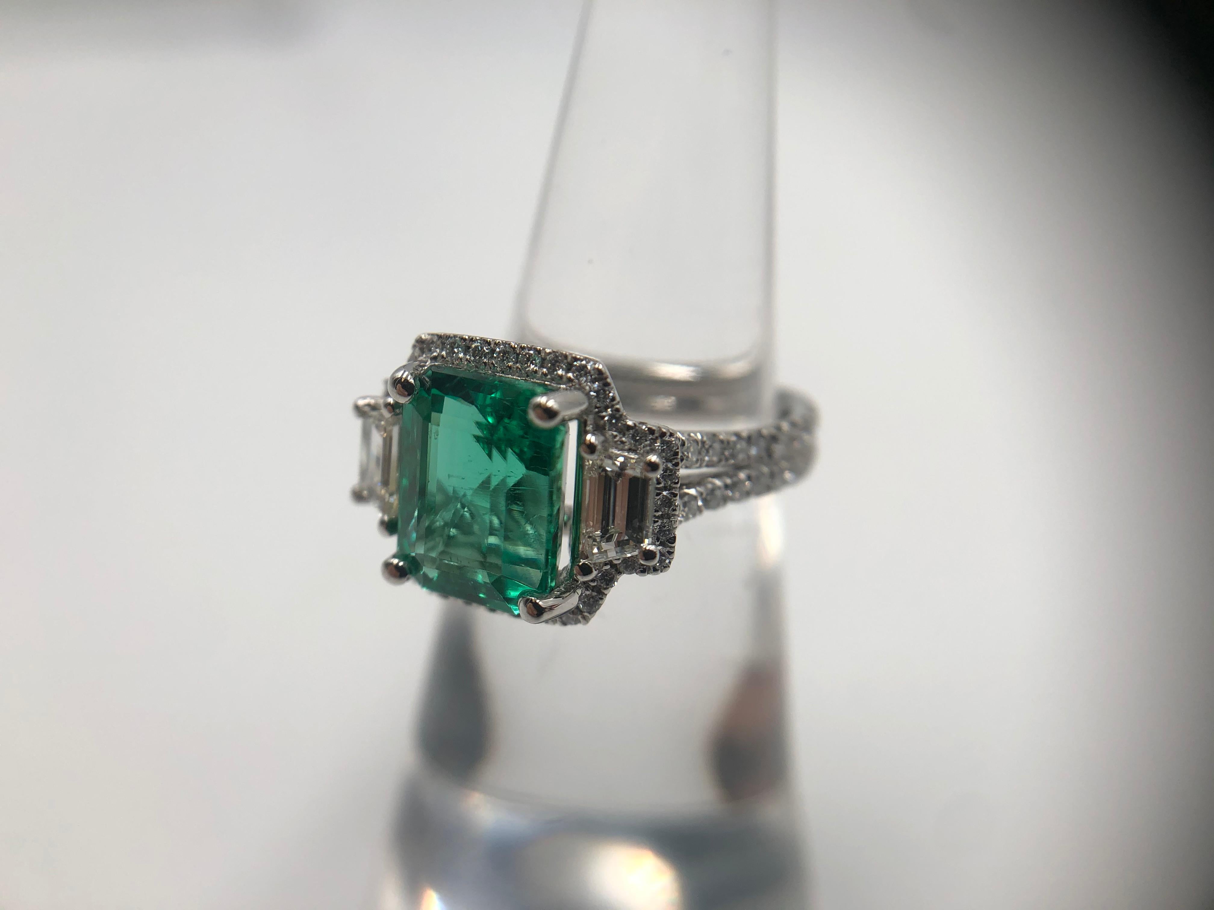 Modern Gorgeous Emerald and Diamond Ring in Platinum For Sale