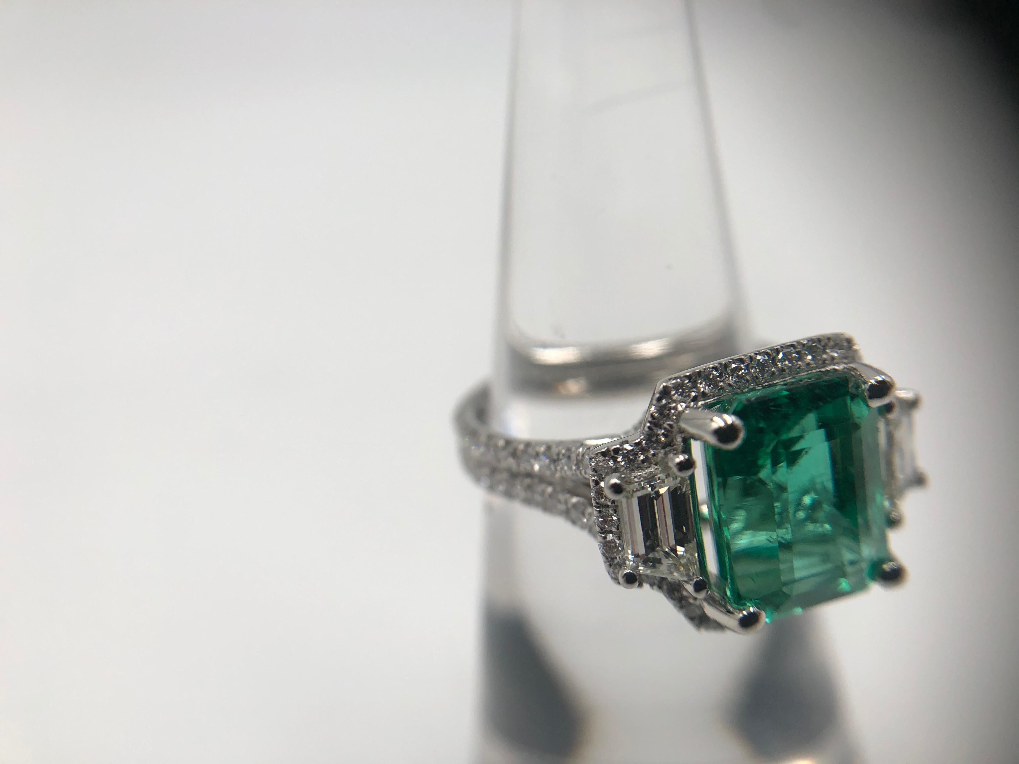 Emerald Cut Gorgeous Emerald and Diamond Ring in Platinum For Sale