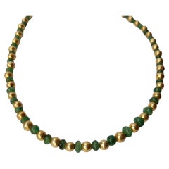 Magnifique collier de perles en argent plaqué or et émeraude