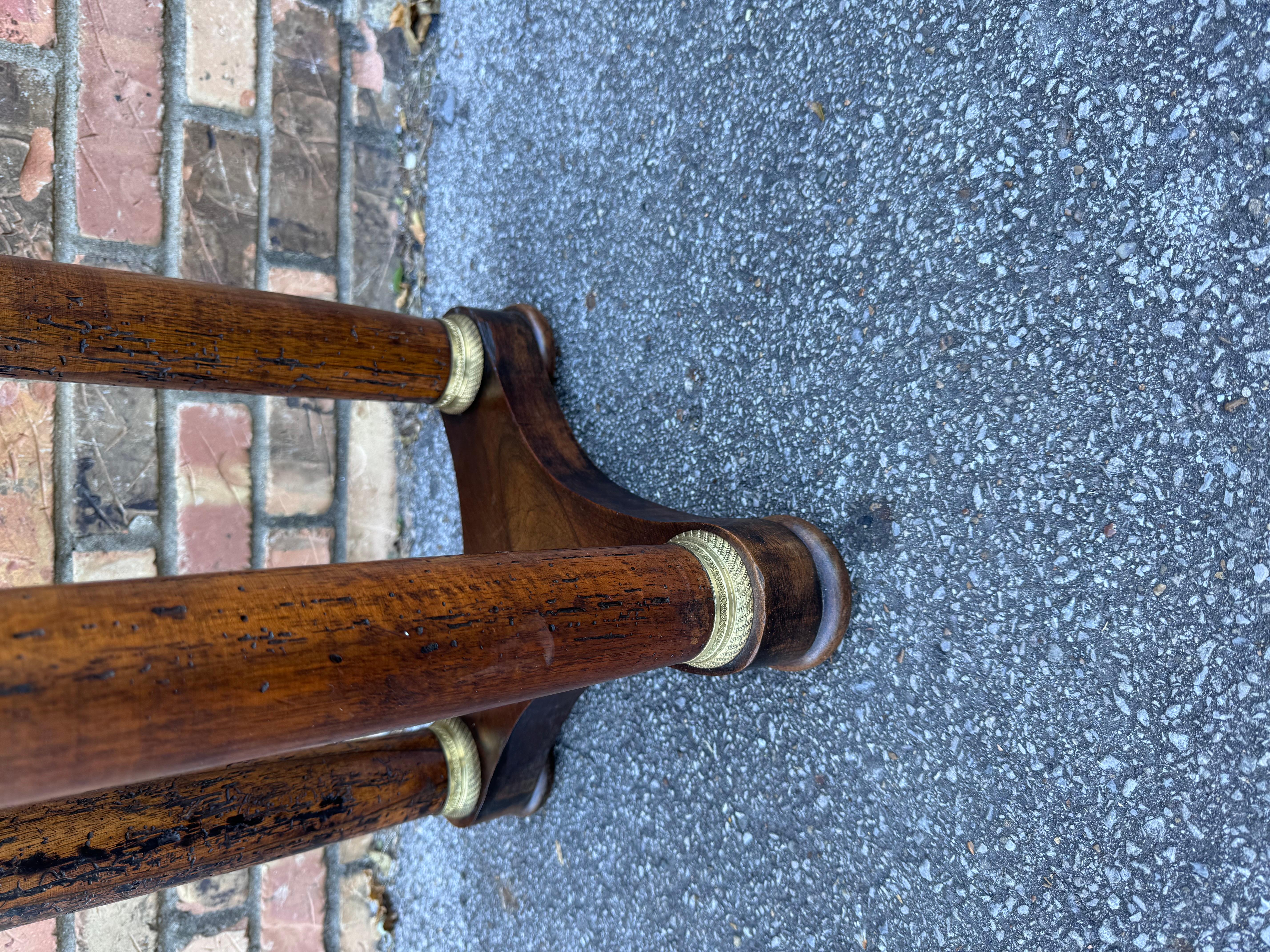 This gorgeous Empire side table has so much character! From the brass fittings at the top and base of the legs to the beautiful patina on the top and legs, this table is a stunner!
It will work in so many decors, from traditional to modern. We hope