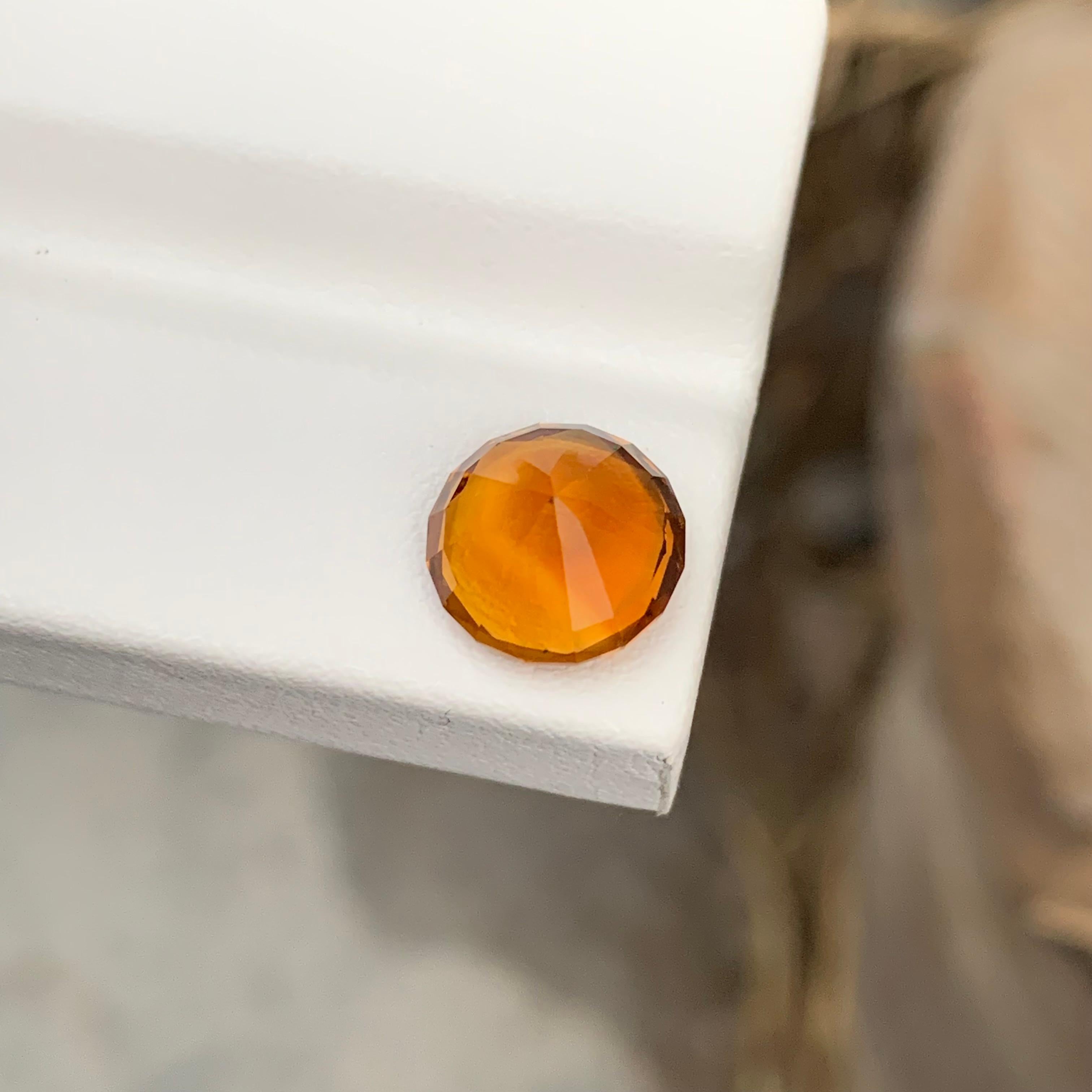 Loose Mandarin Citrine 
Weight: 3.10 Carats 
Dimension: 9.6x9.6x6.3 Mm
Origin: Brazil
Shape: Round
Color: Orange
Certificate: On Demand 
Madeira Citrine, named after the warm and rich tones resembling the sunset over the Madeira region, is a variety