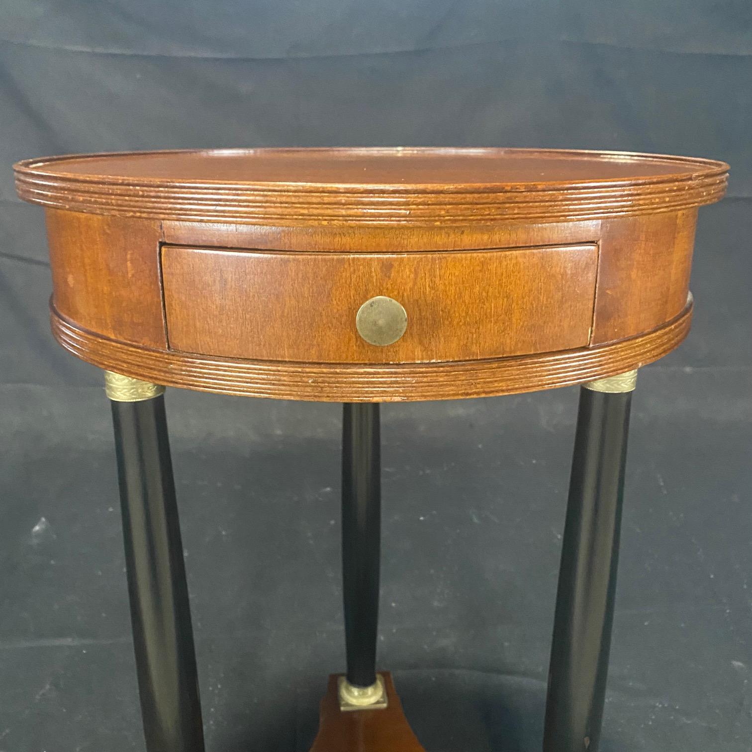 Mid-20th Century Gorgeous French Empire Style Round Side Table with Bronze Mounted Ebony Columns For Sale