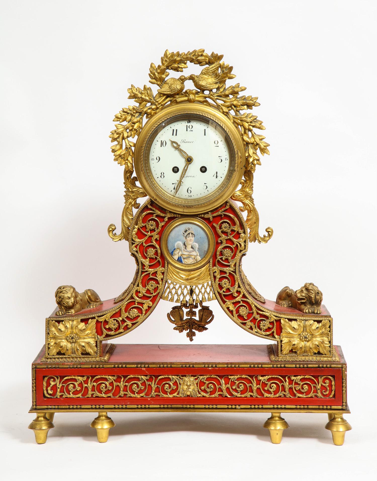 Gorgeous French ormolu gilt bronze-mounted red painted mantel clock, 1870

Clock dial signed Bauce Paris, with Arabic numerals, in a Red case surmounted by love birds within ribbon tied flowering boughs, centered by a portrait miniature of