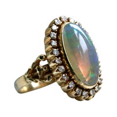 Gorgeous Vintage Opal and Diamond Halo 18 Karat Yellow Gold Ring