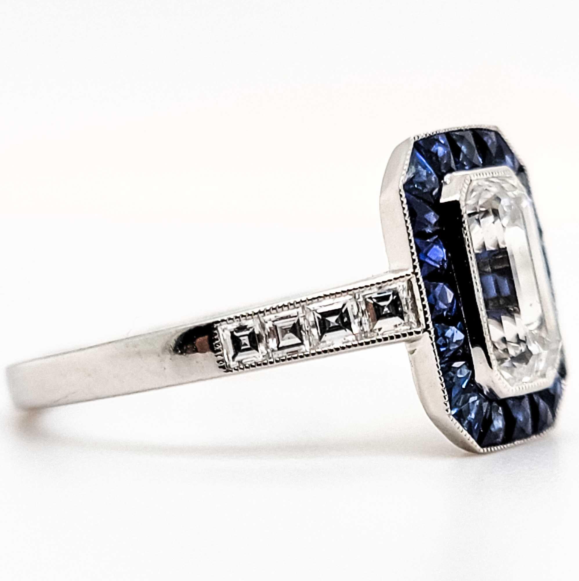 This elegant GIA certified platinum ring is with 1.03 carat emerald cut center diamond with a color and clarity of D-VVS2 accentuated with blue sapphire weighing 0.70 carats and diamonds weighing 0.24 carats ring.

The ring is available for