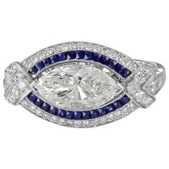 Bague Sophia D. en platine avec diamant central marquise et saphir certifié GIA